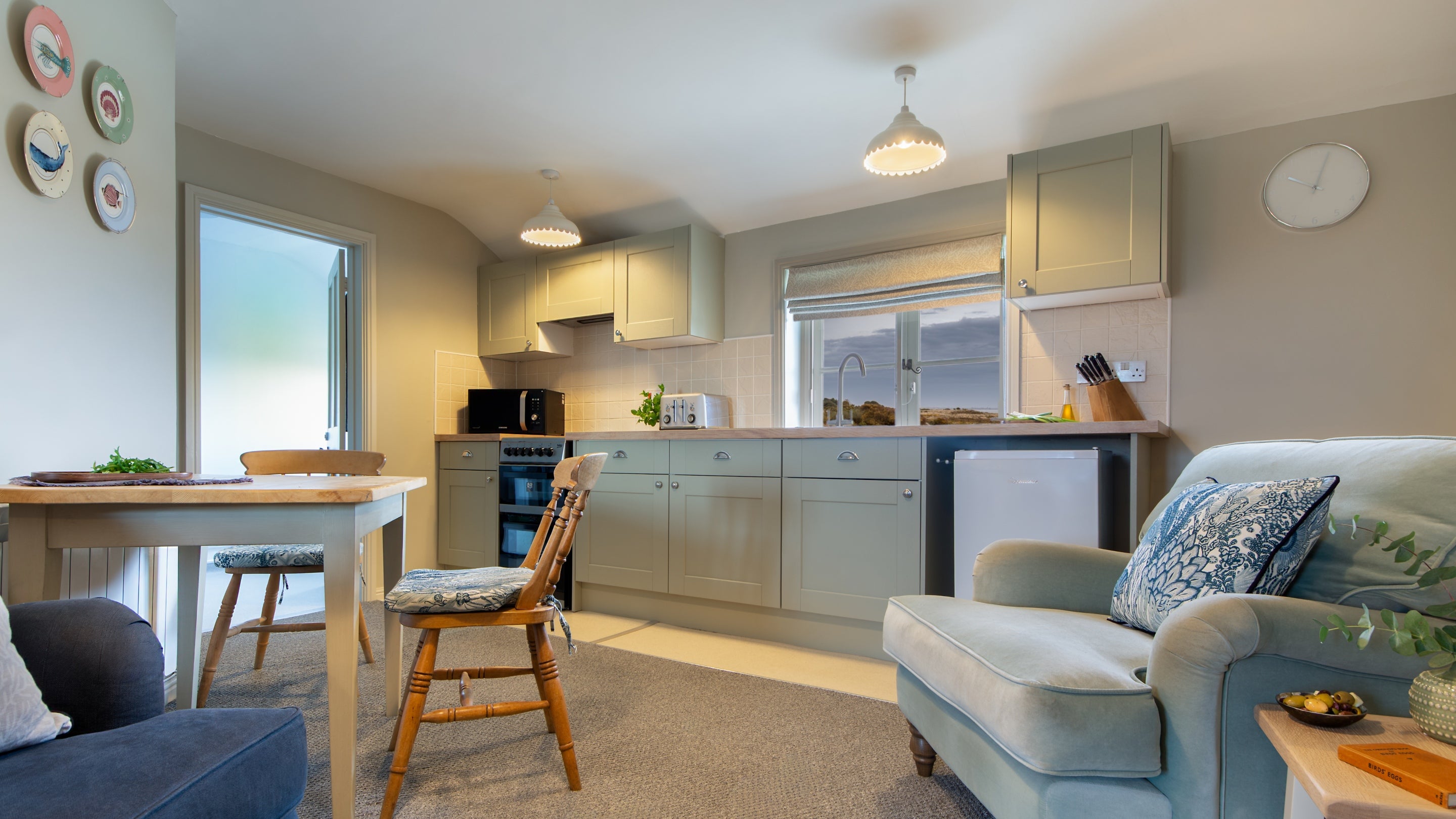 The open plan kitchen, dining and seating area at Stonechat, Suffolk