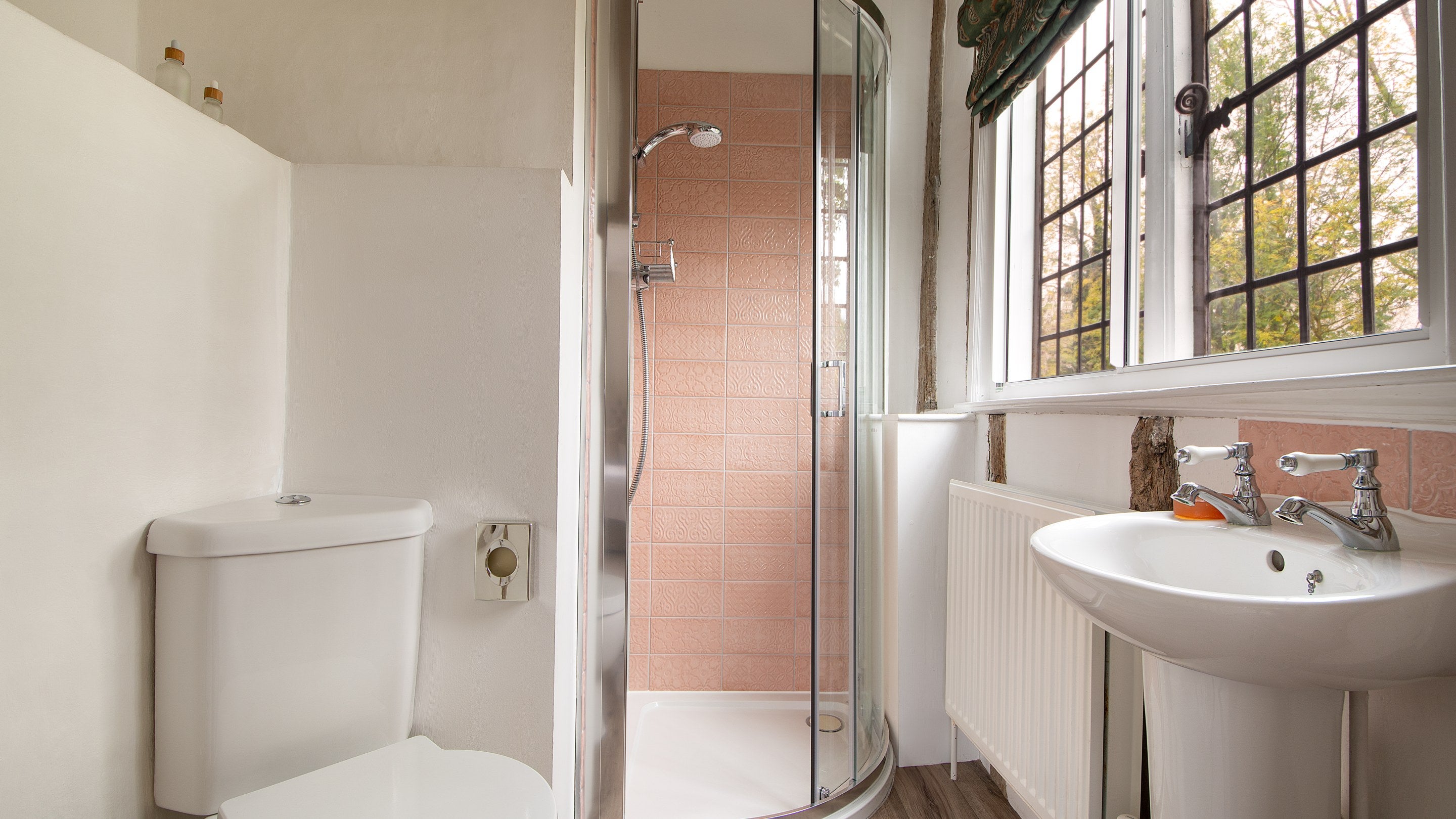 The en-suite shower room of Bedroom 1 'Rosier,' on the first floor of Thorington Hall, Suffolk