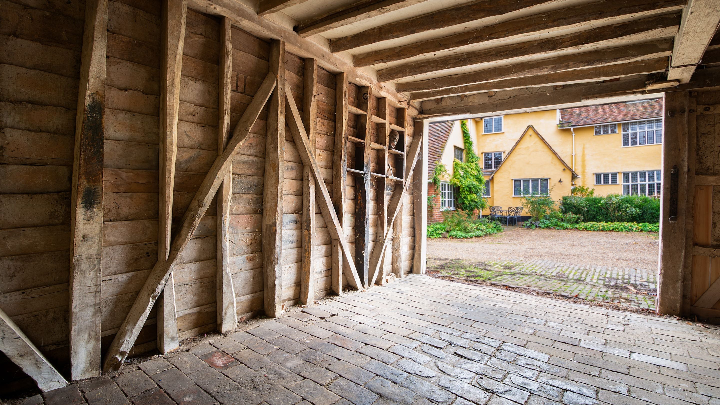 Inside the outbuilding, where bicycles and equipment can be stored, at Thorington Hall, Suffolk