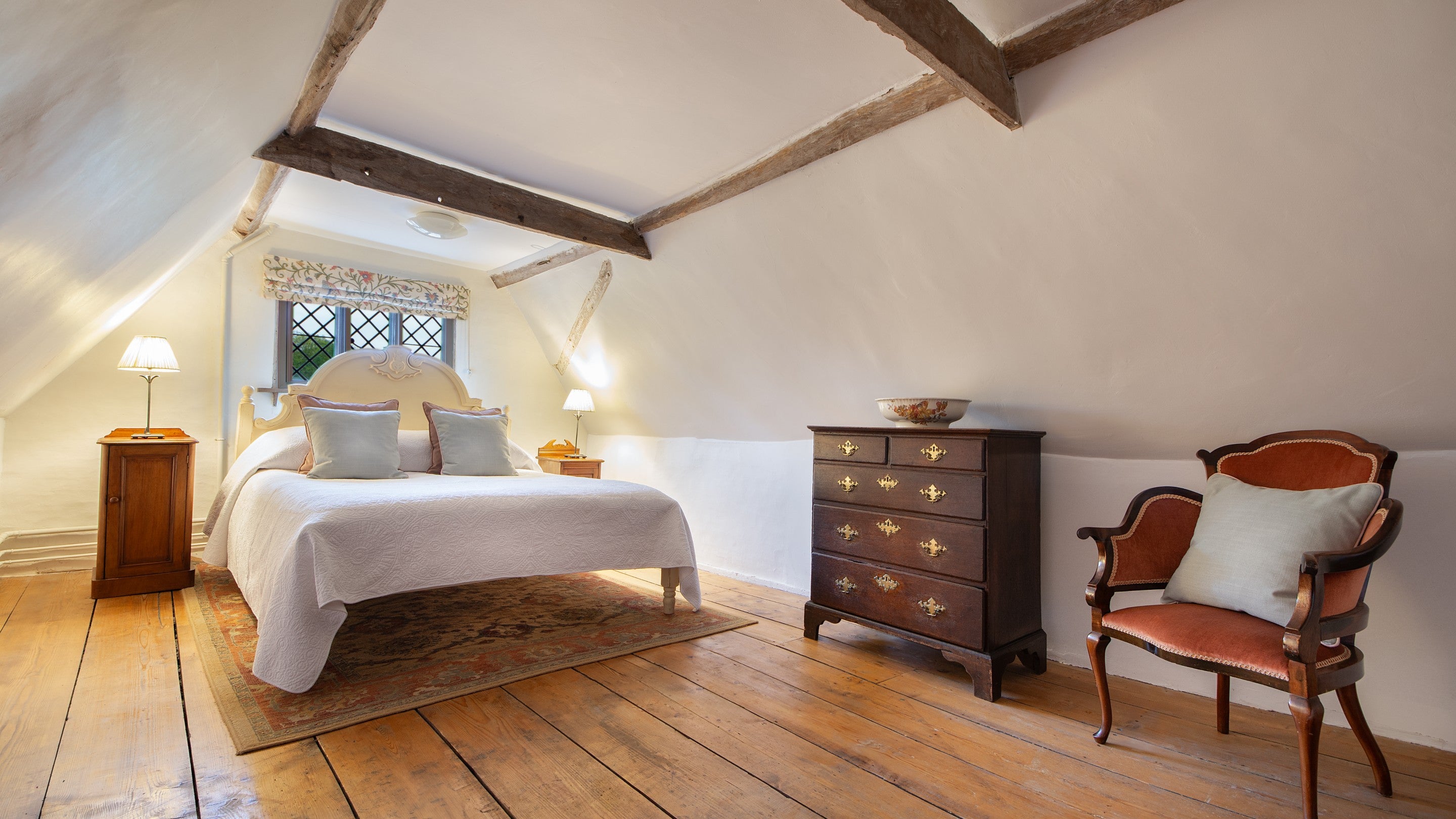 Bedroom 7 'May,' with a king-size bed, on the second floor of Thorington Hall, Suffolk