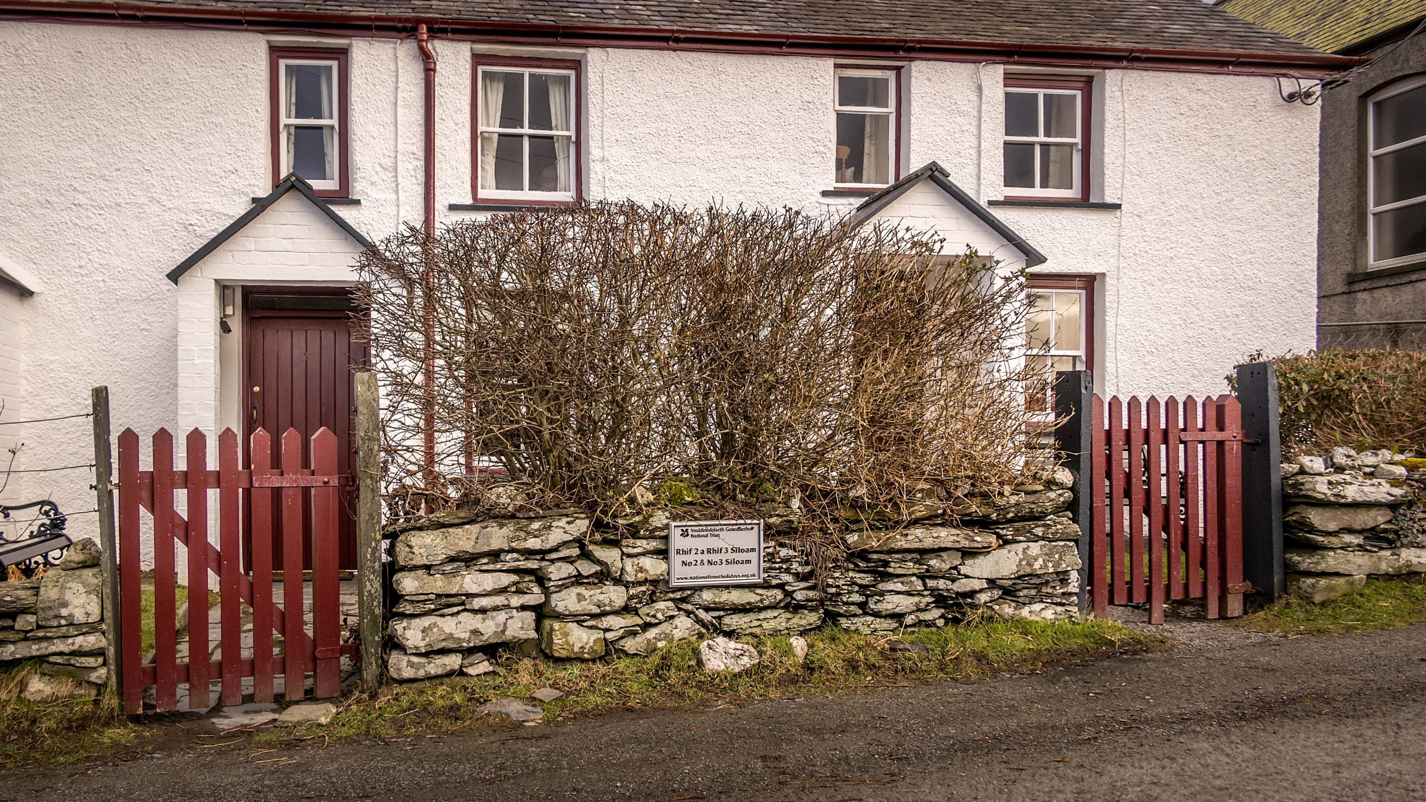 The front exterior of 2 and 3 Siloam Cottage, 2 is in the centre, Conwy