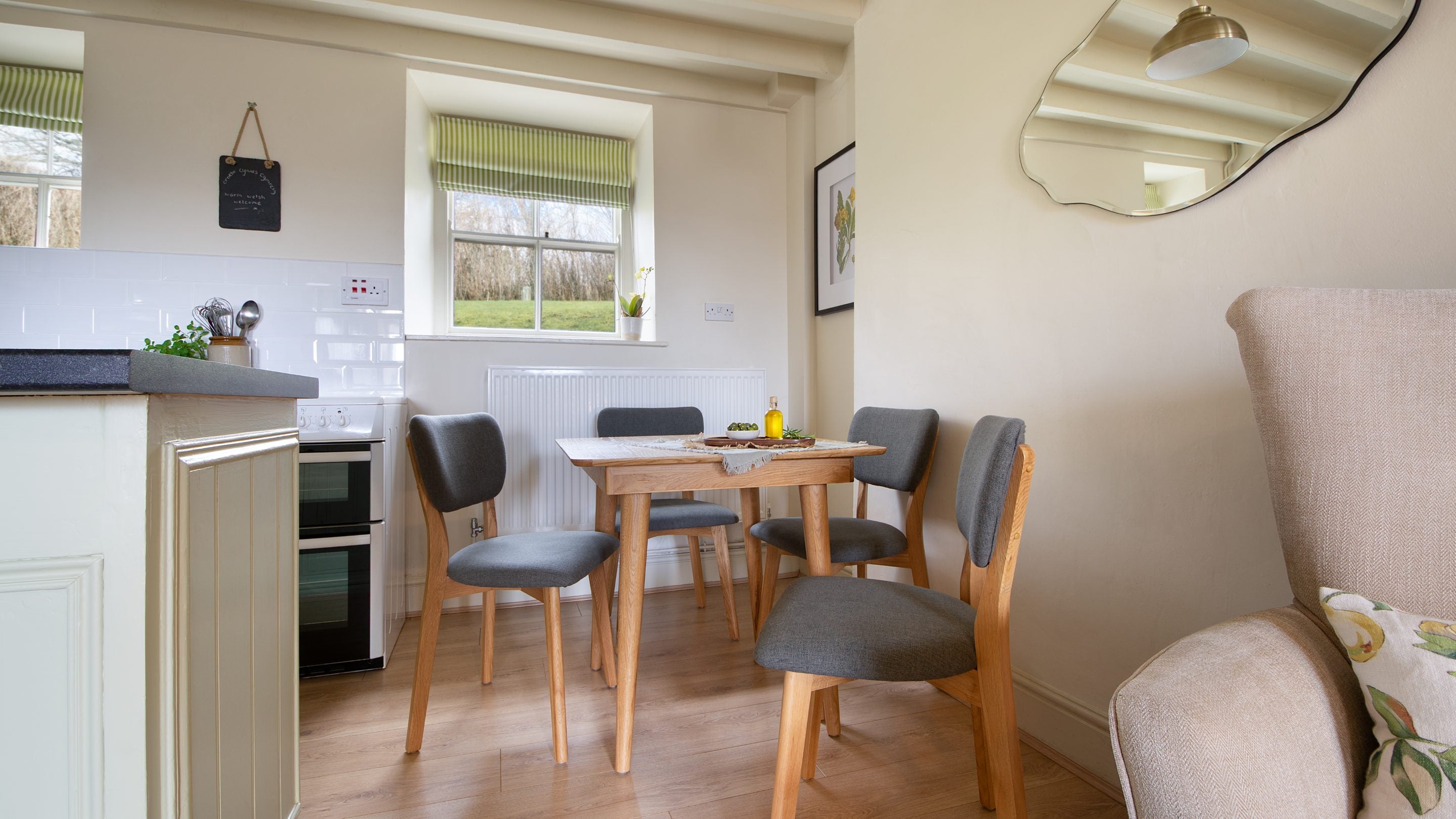 The kitchen table in the open-plan room at 2 Siloam Cottage, Conwy