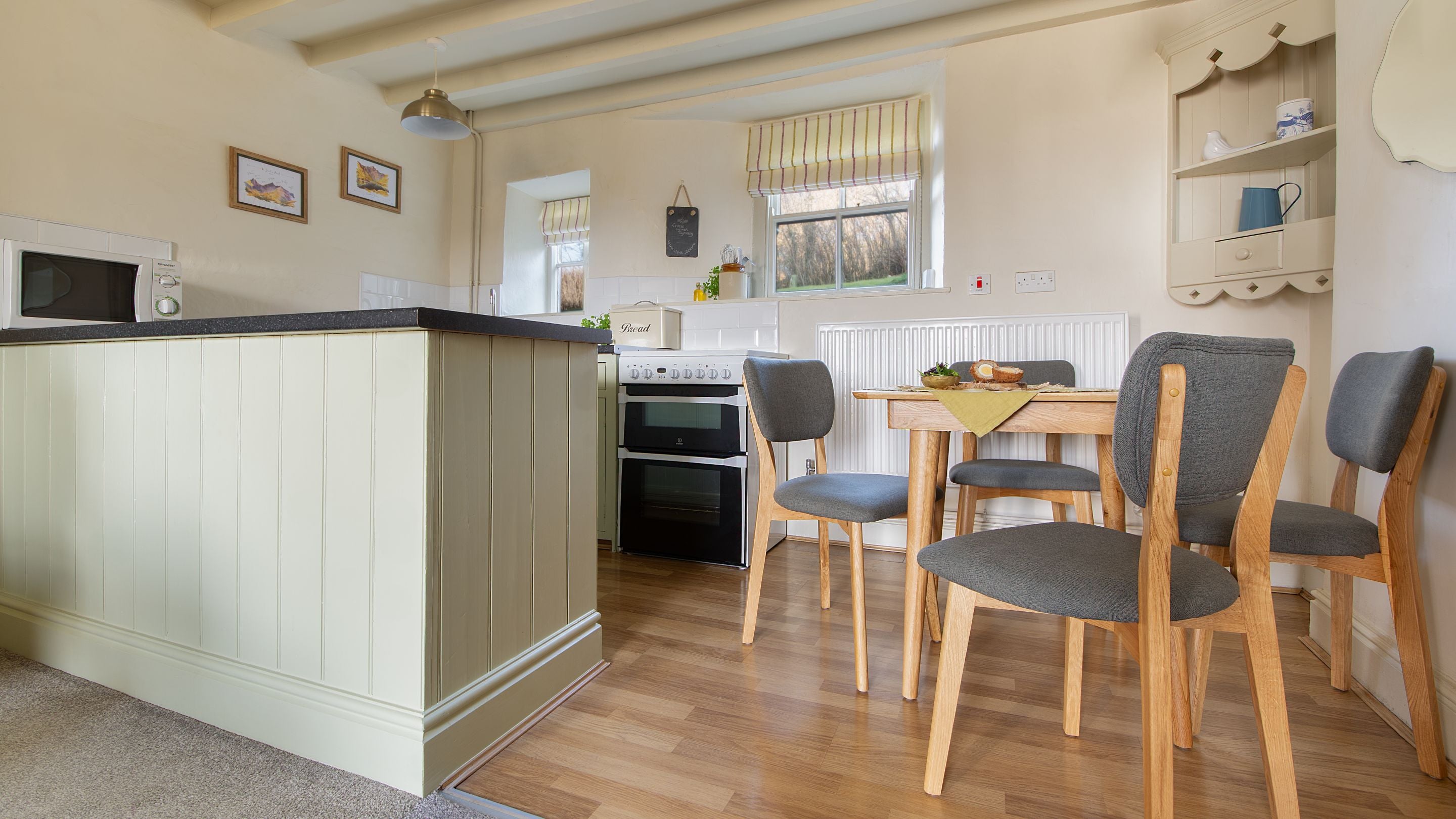 The kitchen table in the open-plan area at 3 Siloam Cottage, Conwy