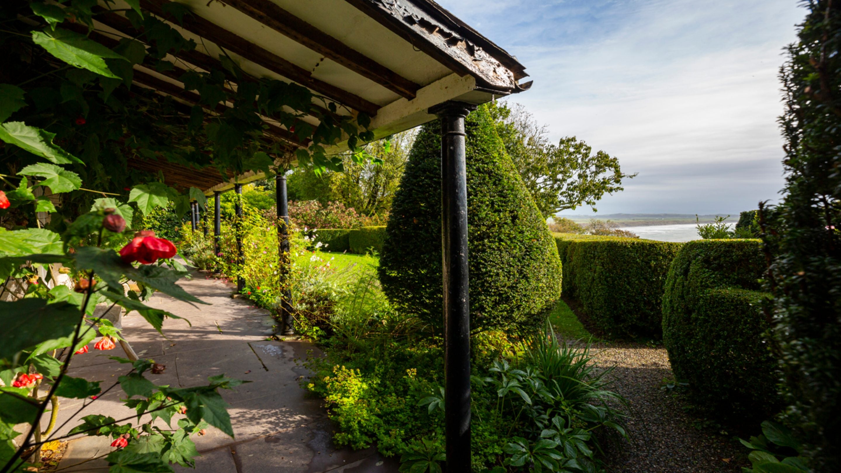 Coastal views from the garden at Plas yn Rhiw, Gwynedd