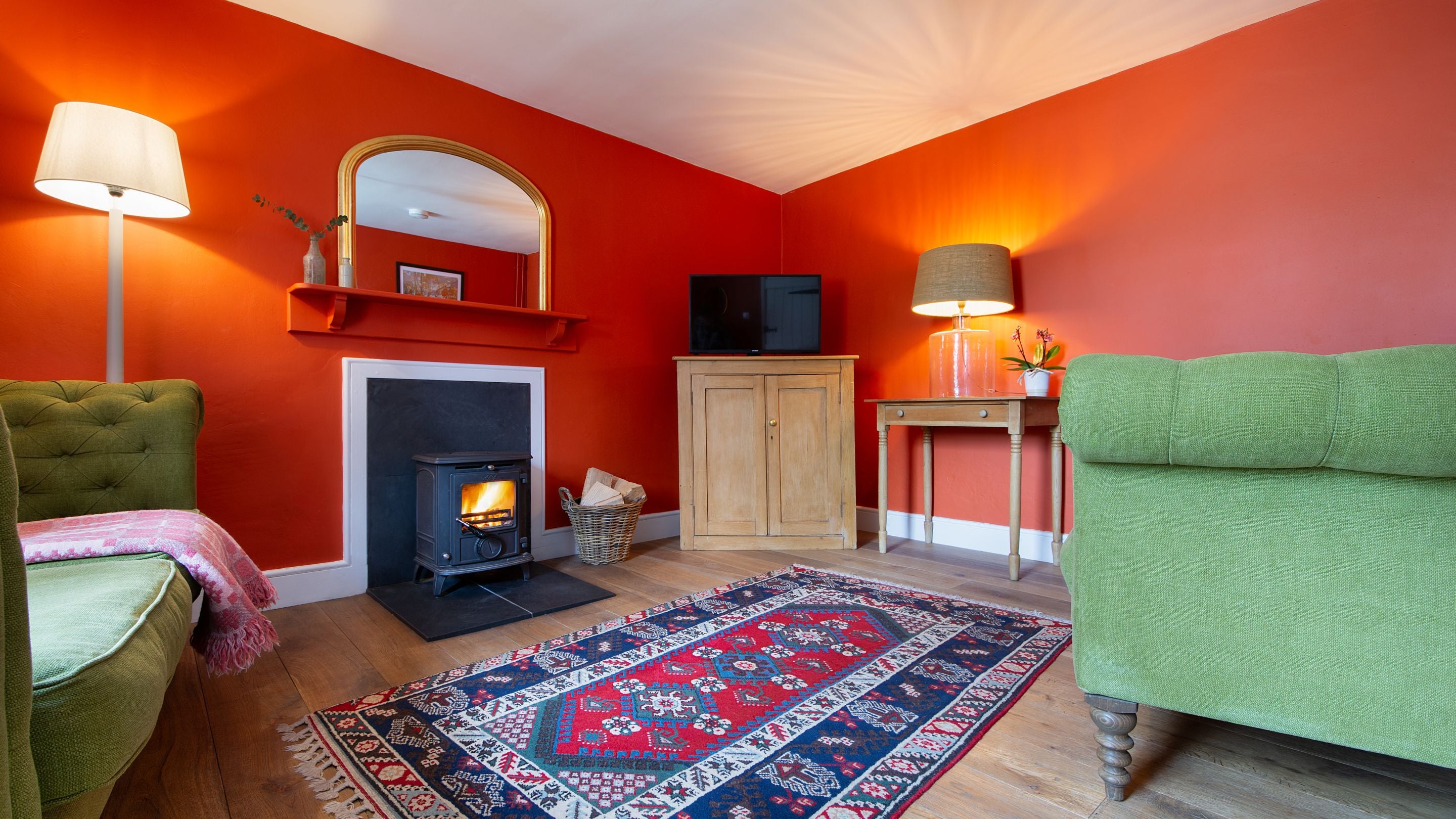 The sitting room with woodburner at Caerllan, Caerllan