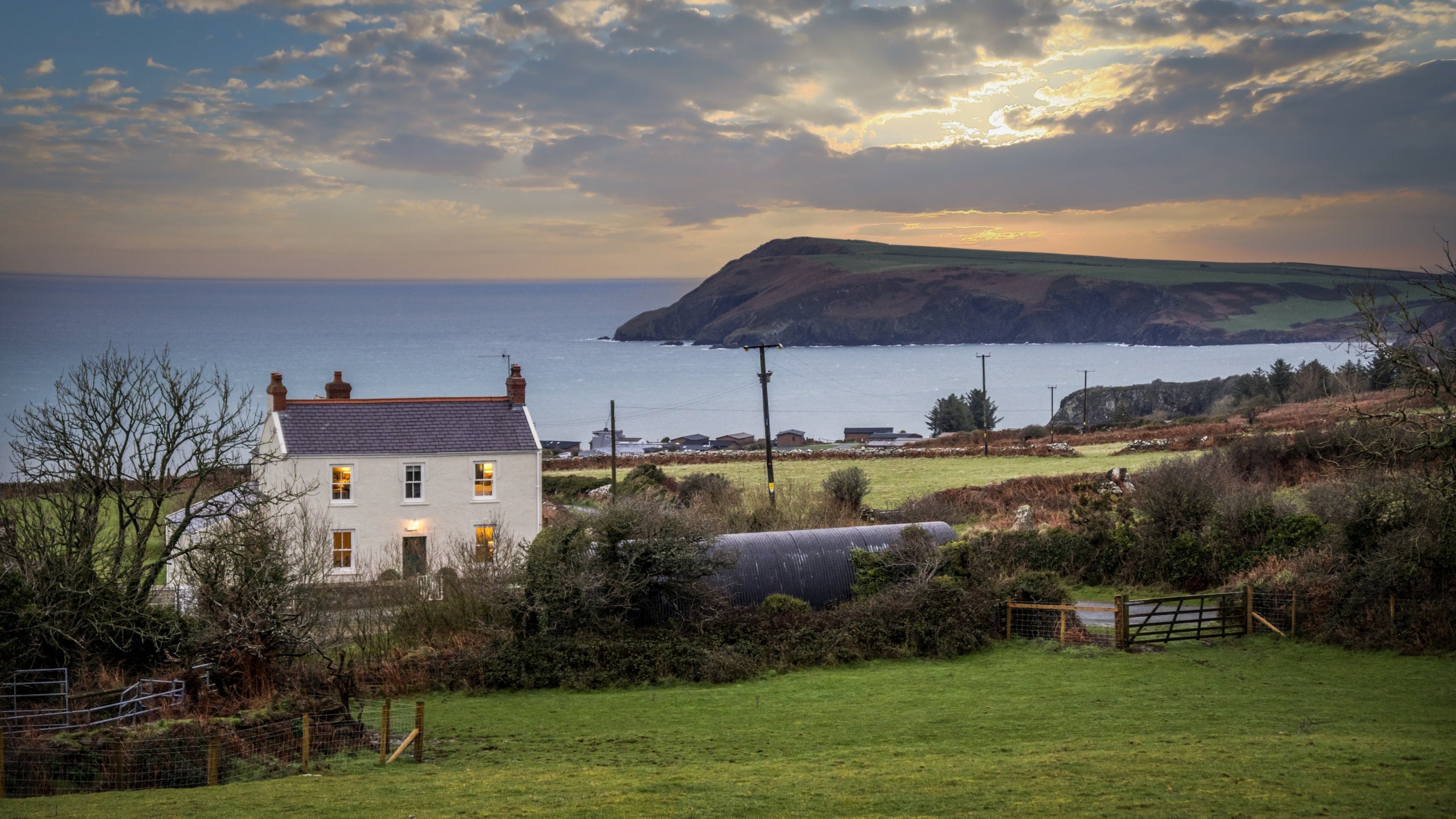 The exterior of Castell Farmhouse and the surrounding area, Pembrokeshire
