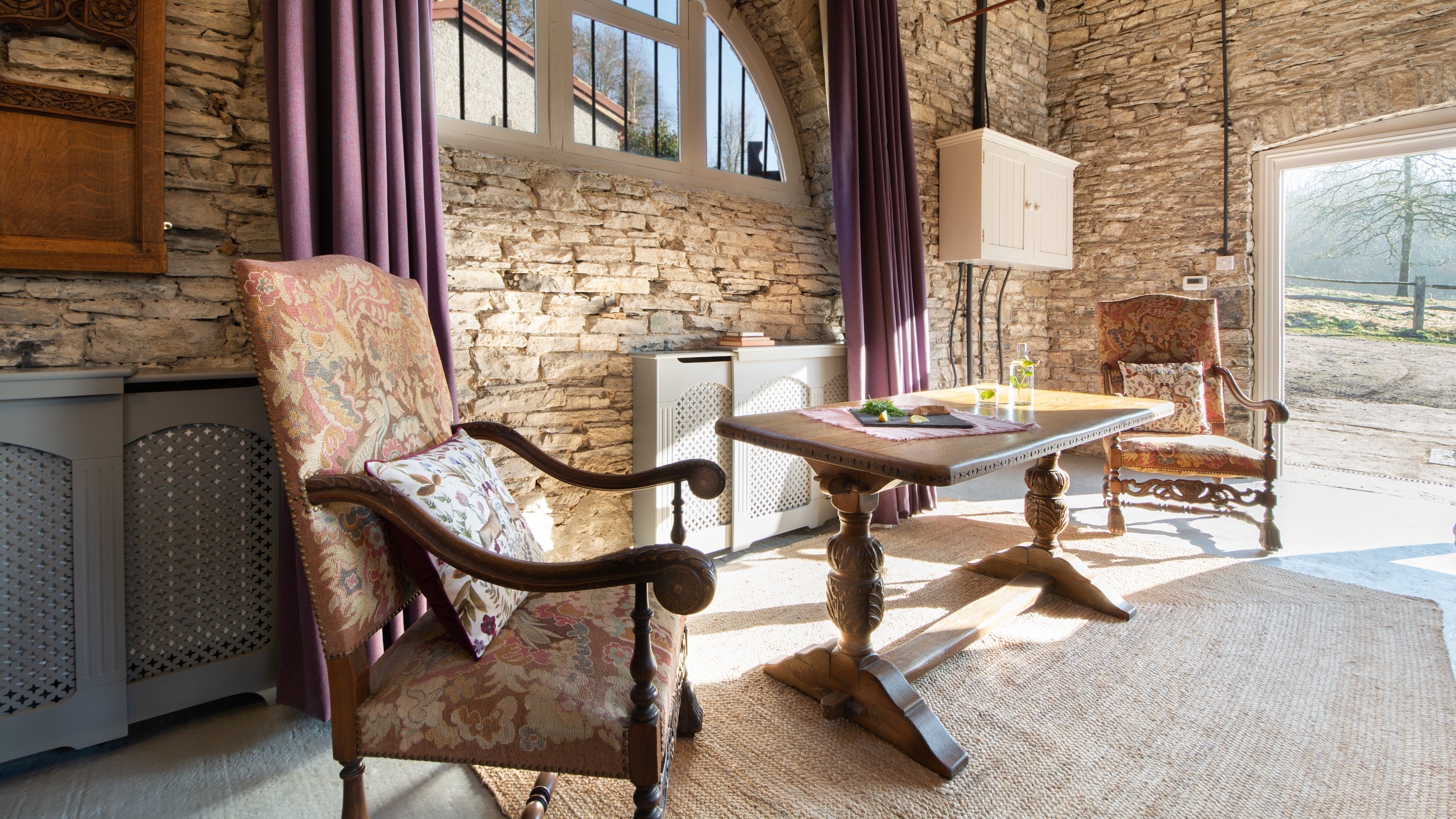 The dining area within the open-plan living room at Dinefwr Deer Lodge, Carmarthenshire