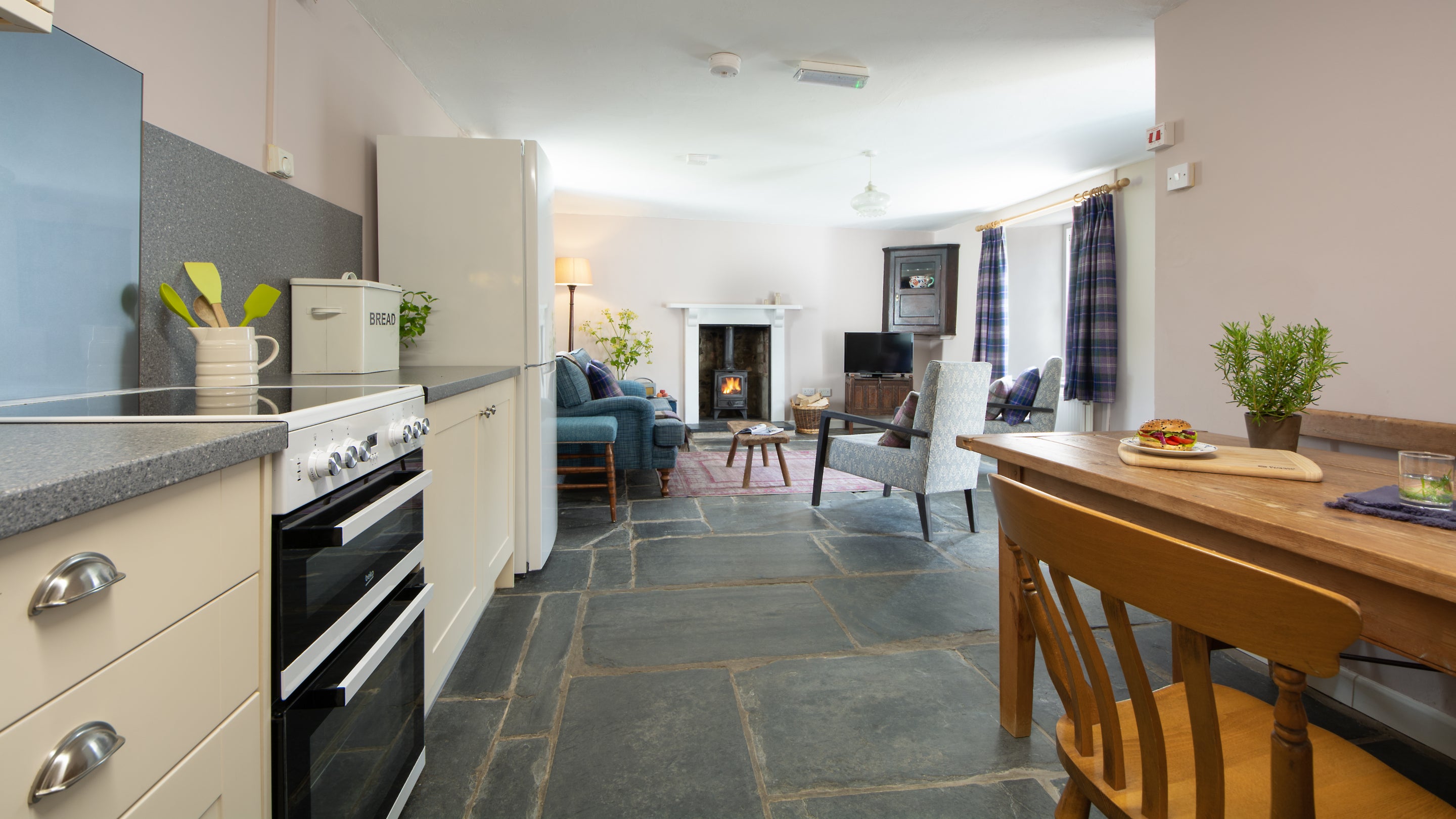 The dining kitchen and sitting room at Farm Cottage, Pembrokeshire