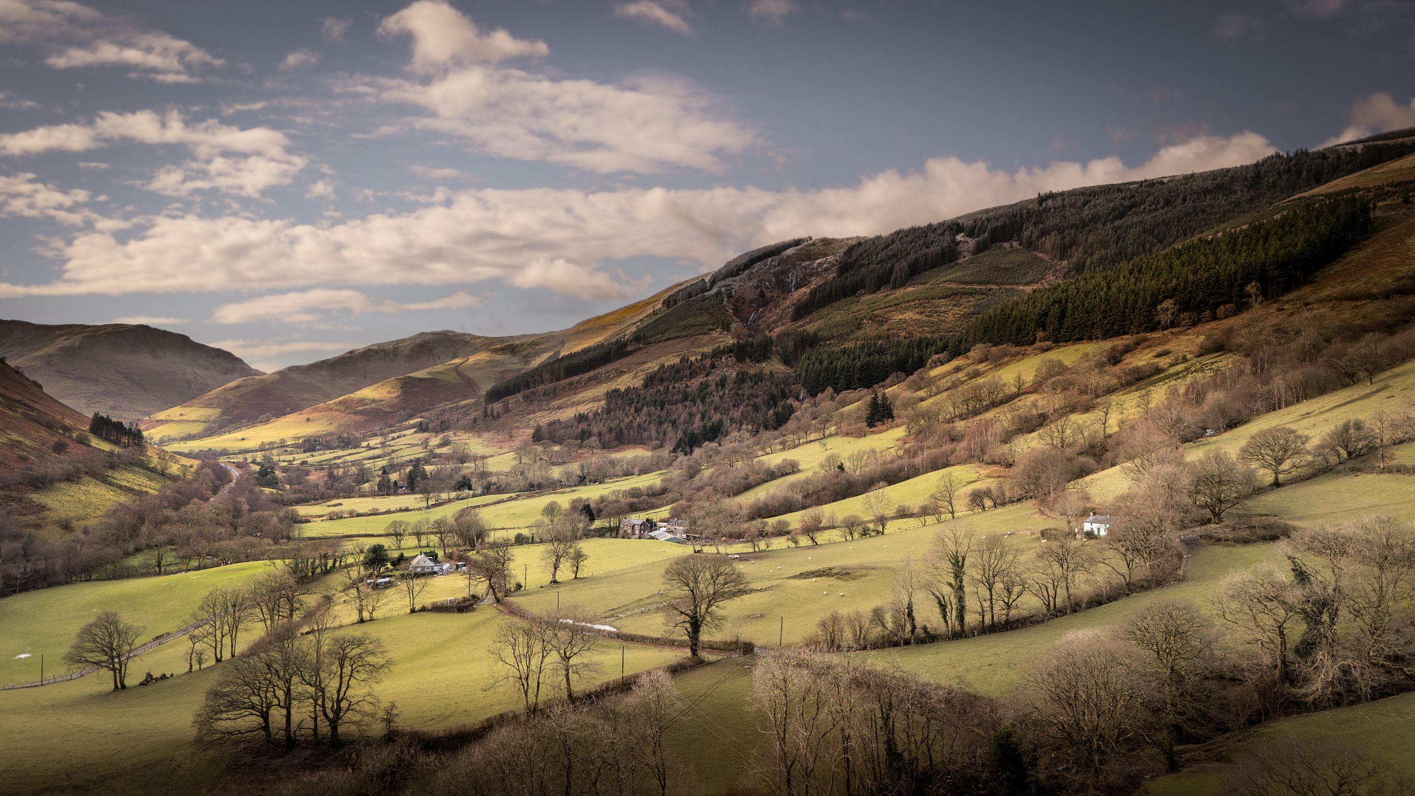 An aerial view of the valley around Fron Dirion, Powys