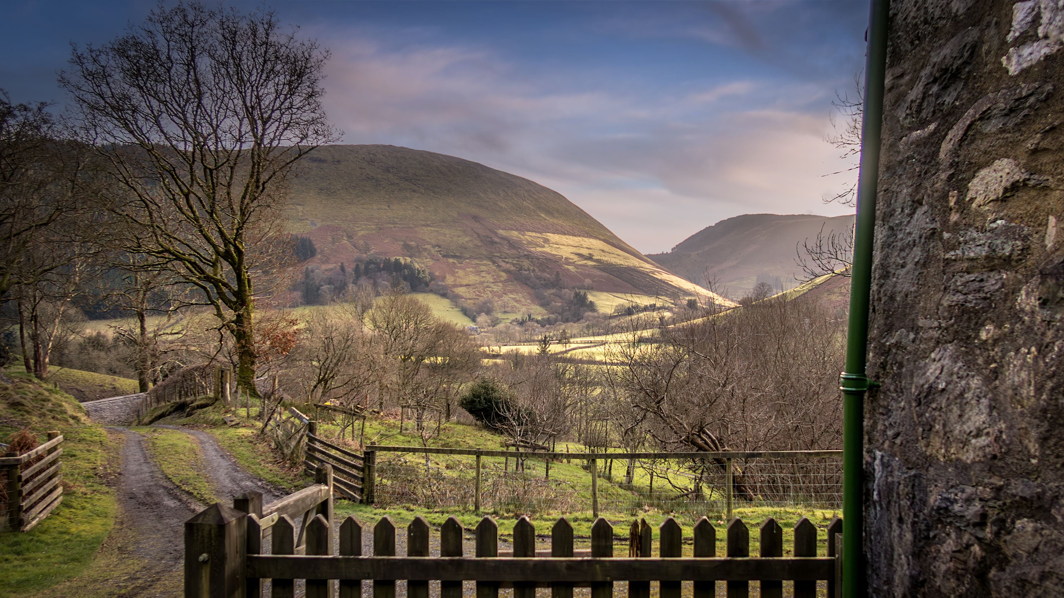 Views of hills from the front harden at Fron Dirion, Powys