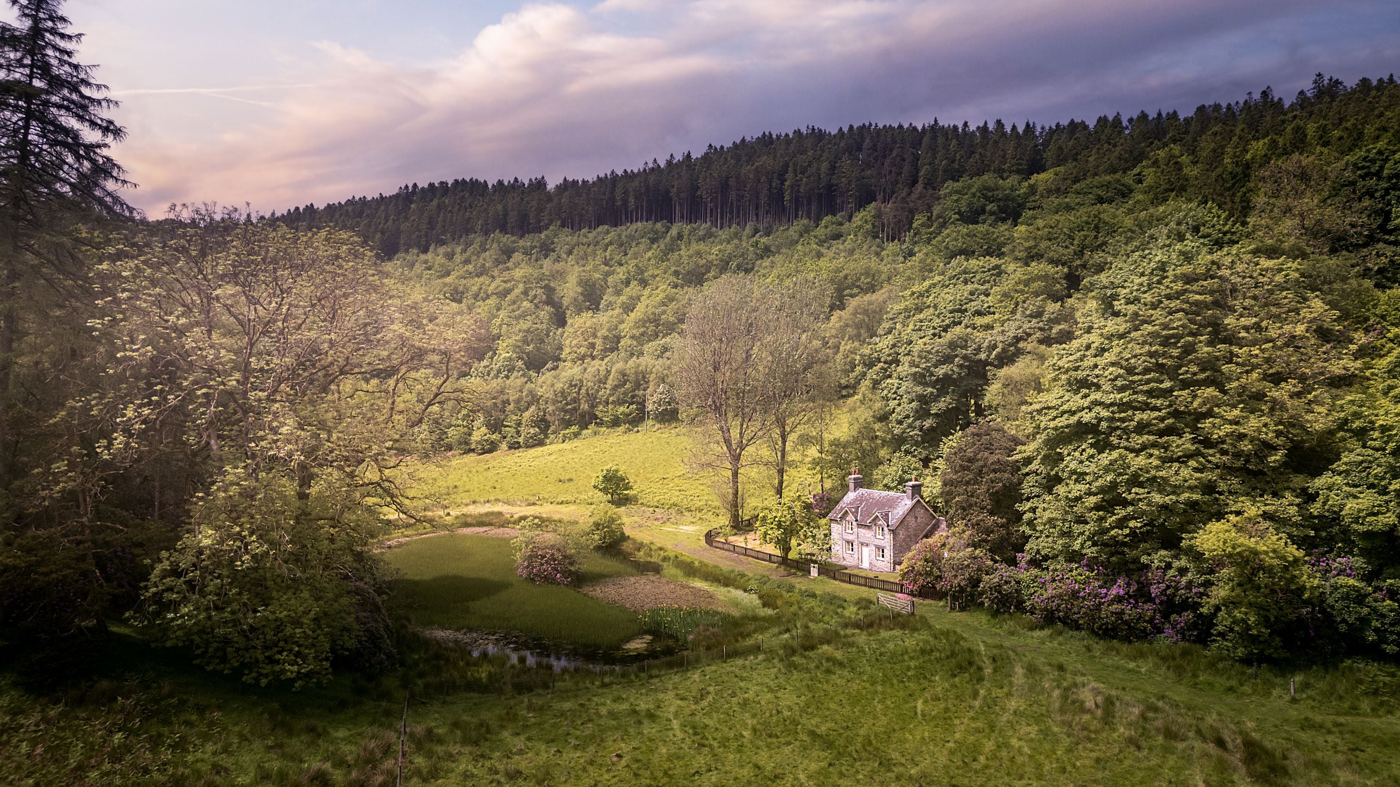 An aerial view of Lady's Walk, the old duck pond and Hawthorn Cottage, Ceredigion