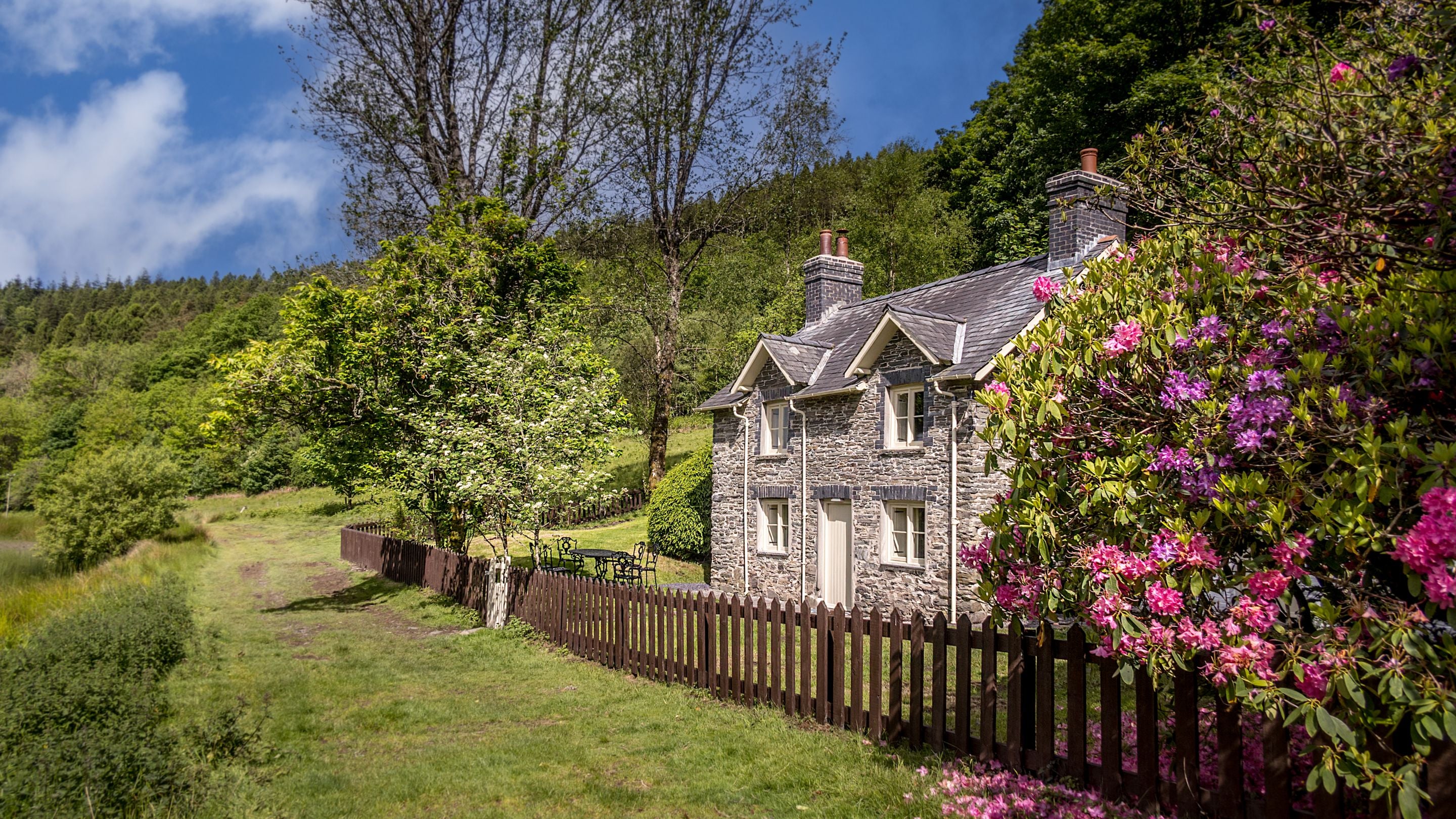 Lady's Walk passes Hawthorn Cottage on the Hafod Estate, Ceredigion