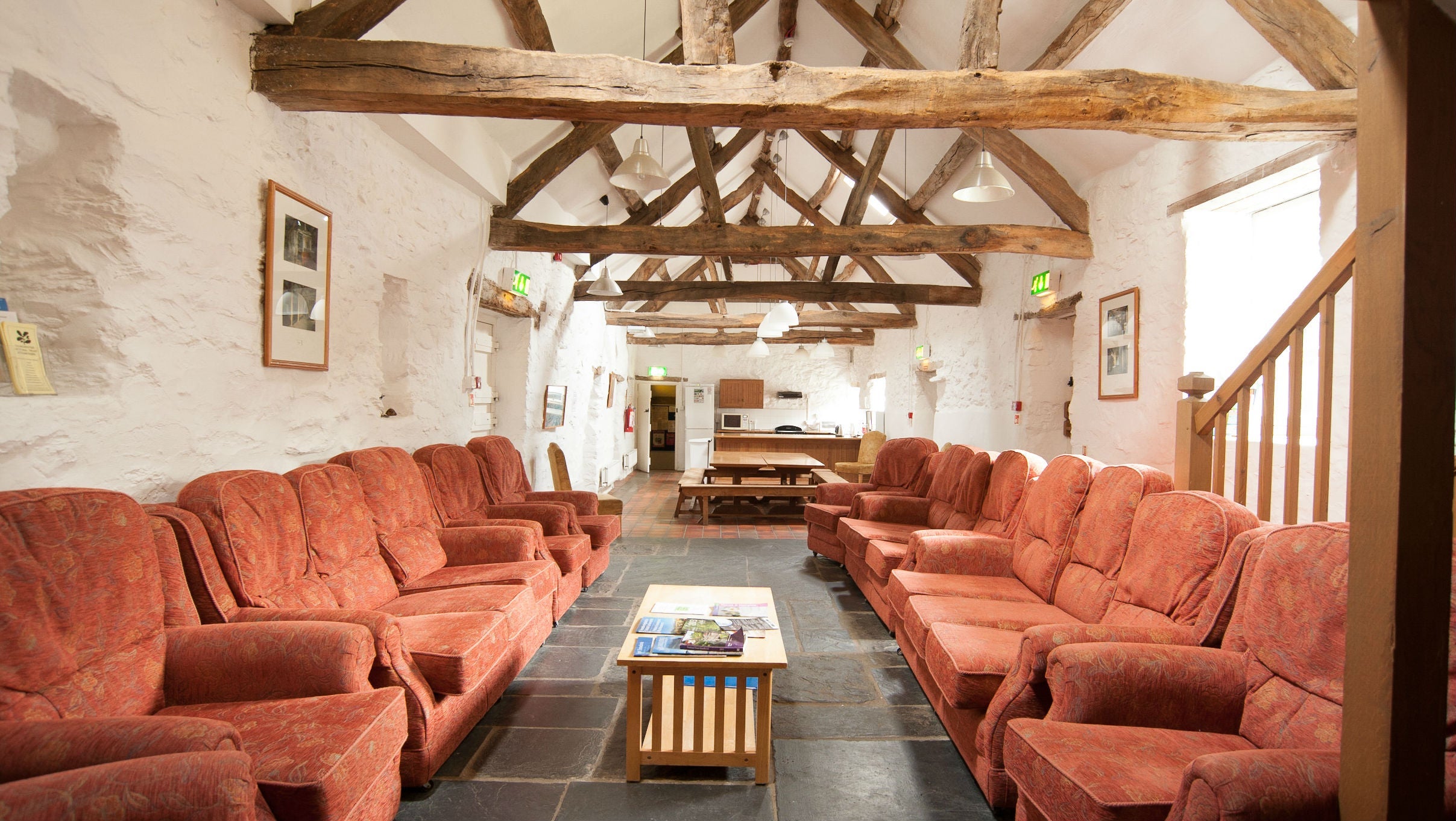 The communal seating area at Hendre Isaf bunkhouse, Wales