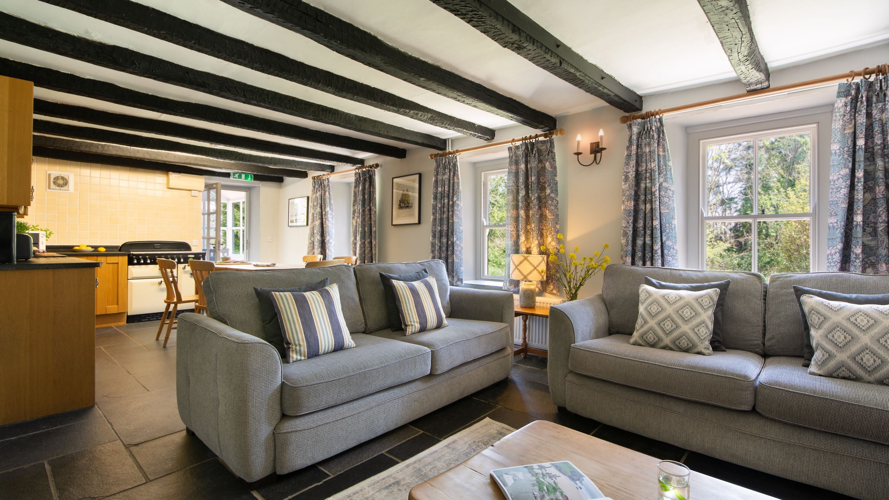 The open-plan kitchen, dining and sitting room at Little Milford Farmhouse, Pembrokeshire