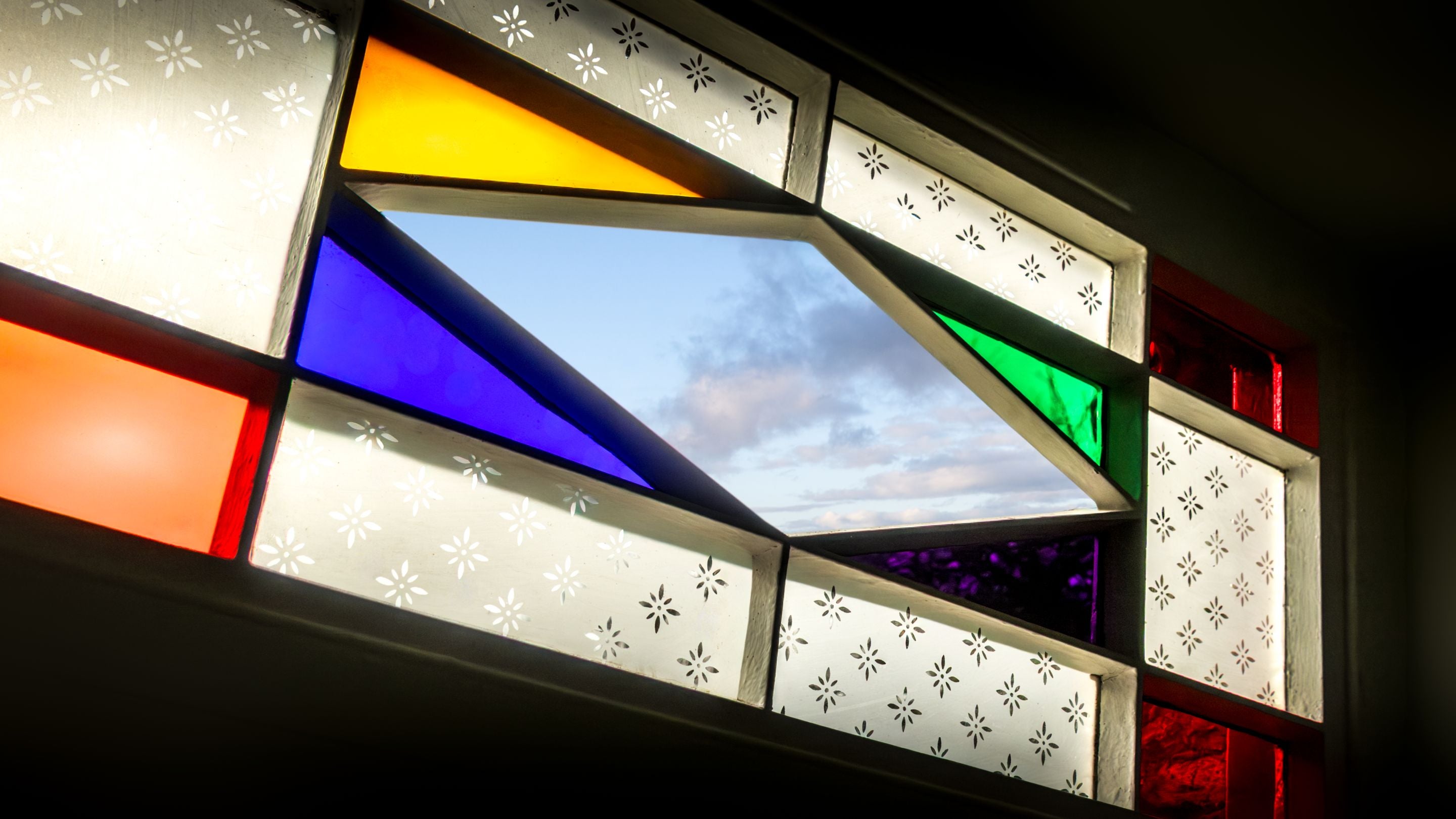 The stained-glass window above the front door at Llanborth Farmhouse, Ceredigion