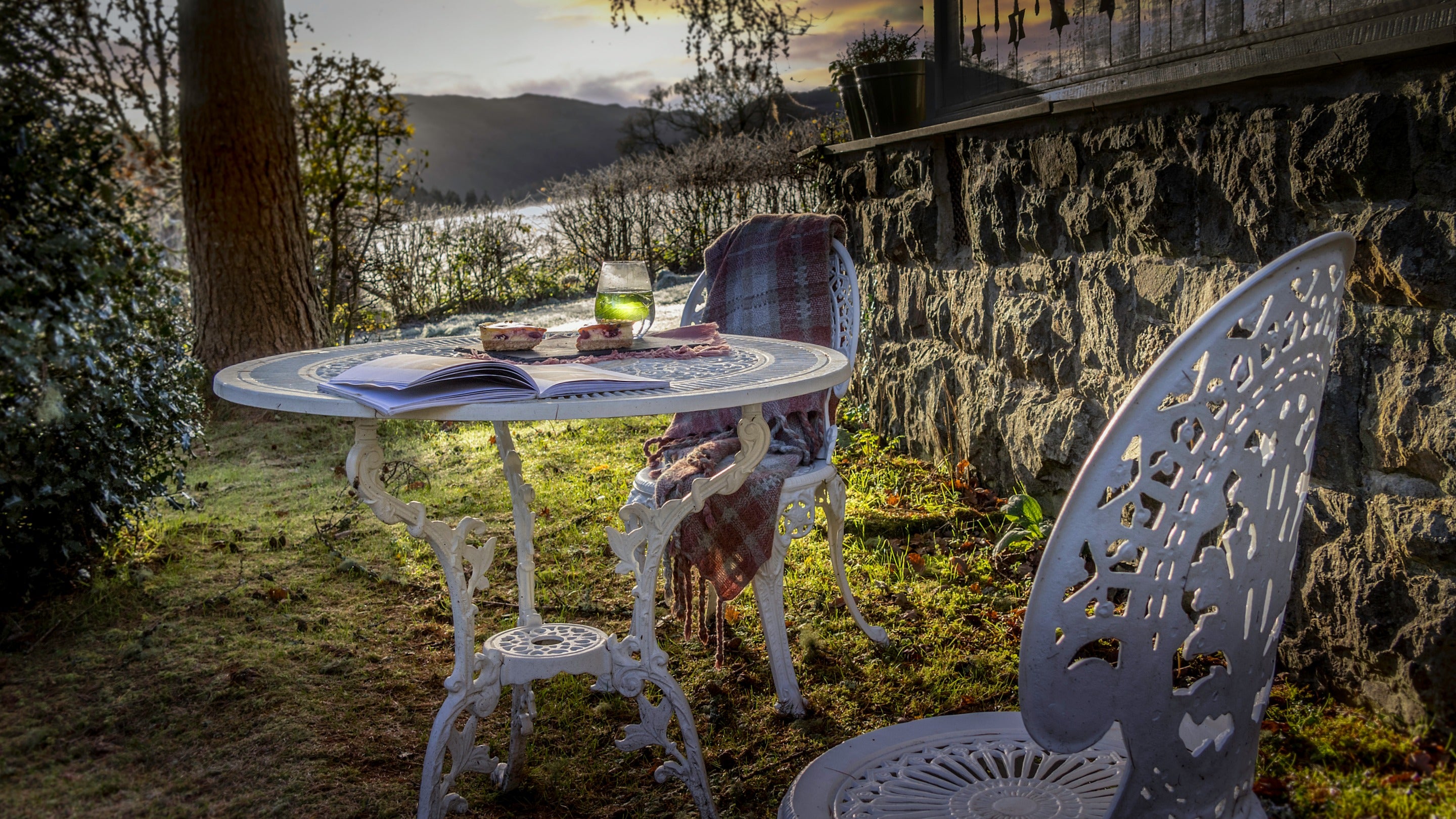 The outdoor table and chairs at Nant Las in the winter light, Gwynedd