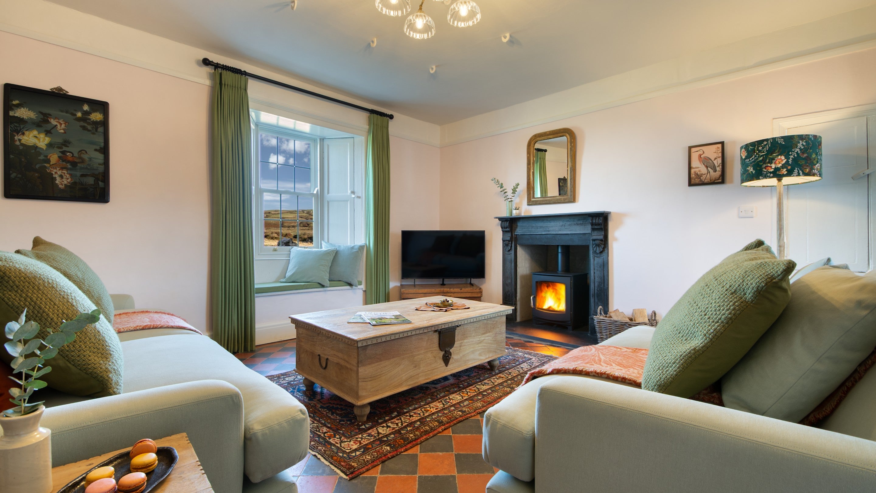 The sitting room with woodburner at Newgale Wood Farm, Pembrokeshire