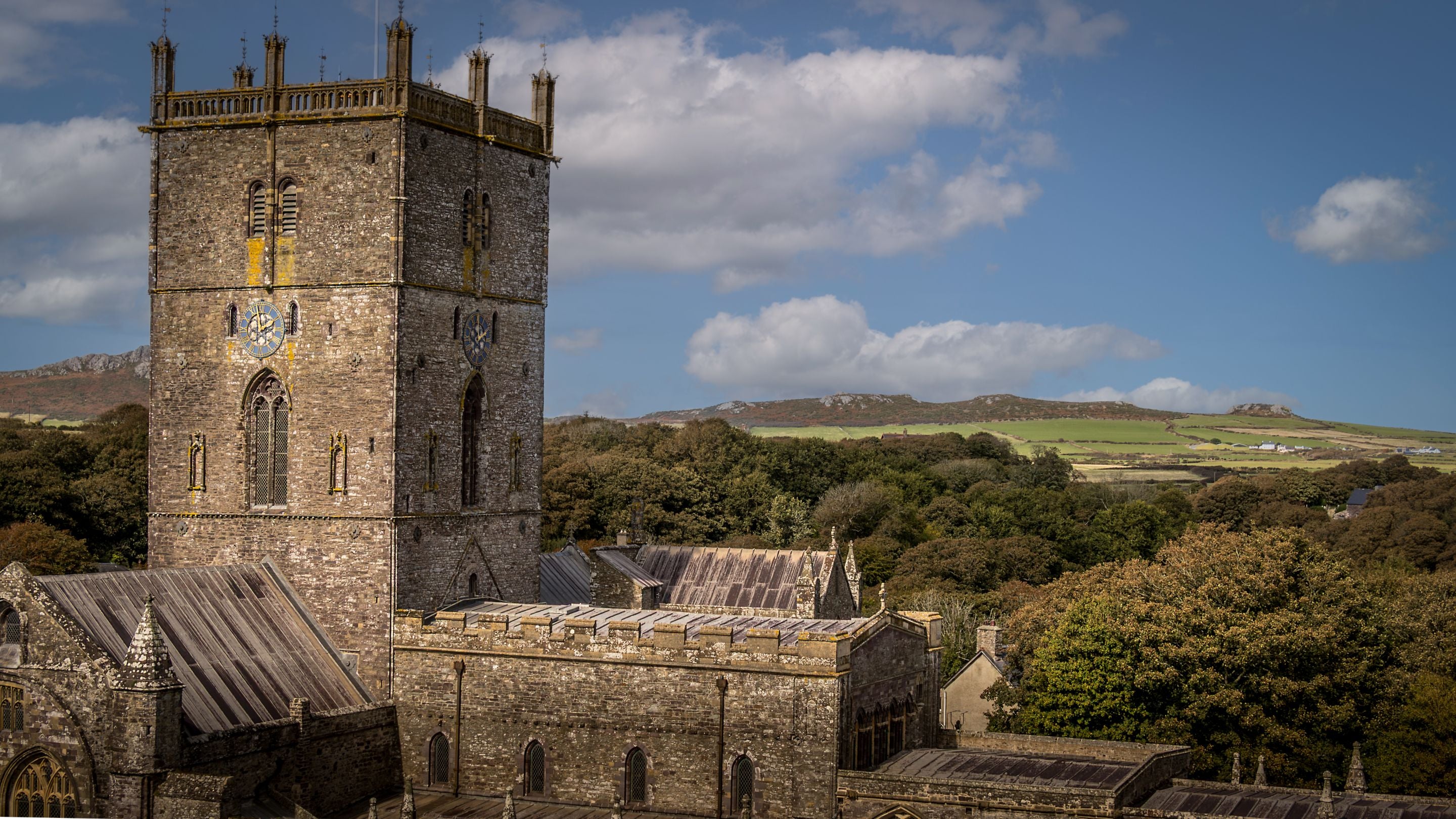An aerial view of St Davids Cathedral and the countryside beyond, Pembrokeshire