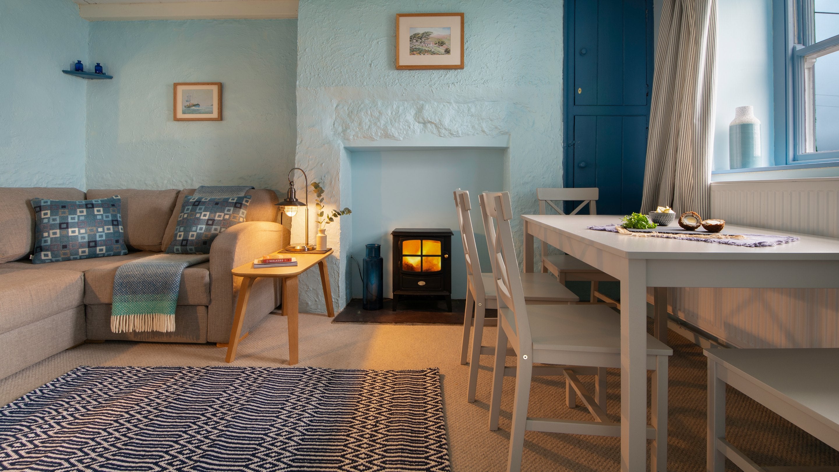 The sitting and dining room at Pant Rhiw Cottage, Gwynedd