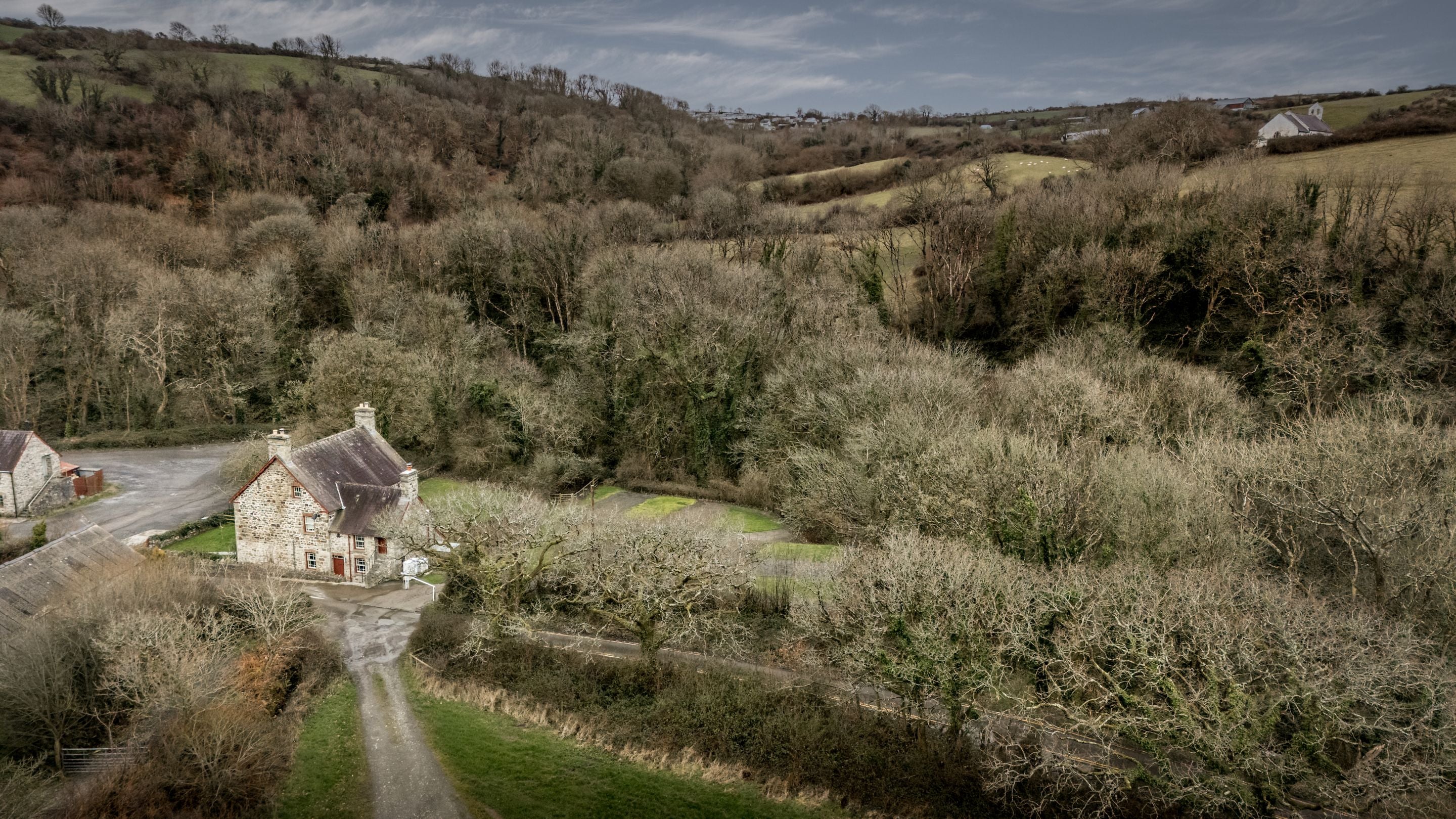 An aerial view of Penbryn Cottage and neighbouring Llanborth Farmhouse, Ceredigion