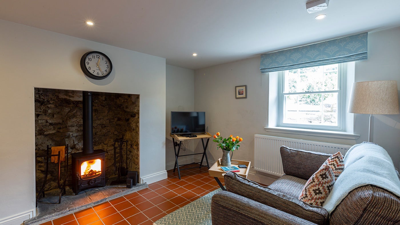 The kitchen, dining room and sitting room at Penbryn Cottage, Llandysul