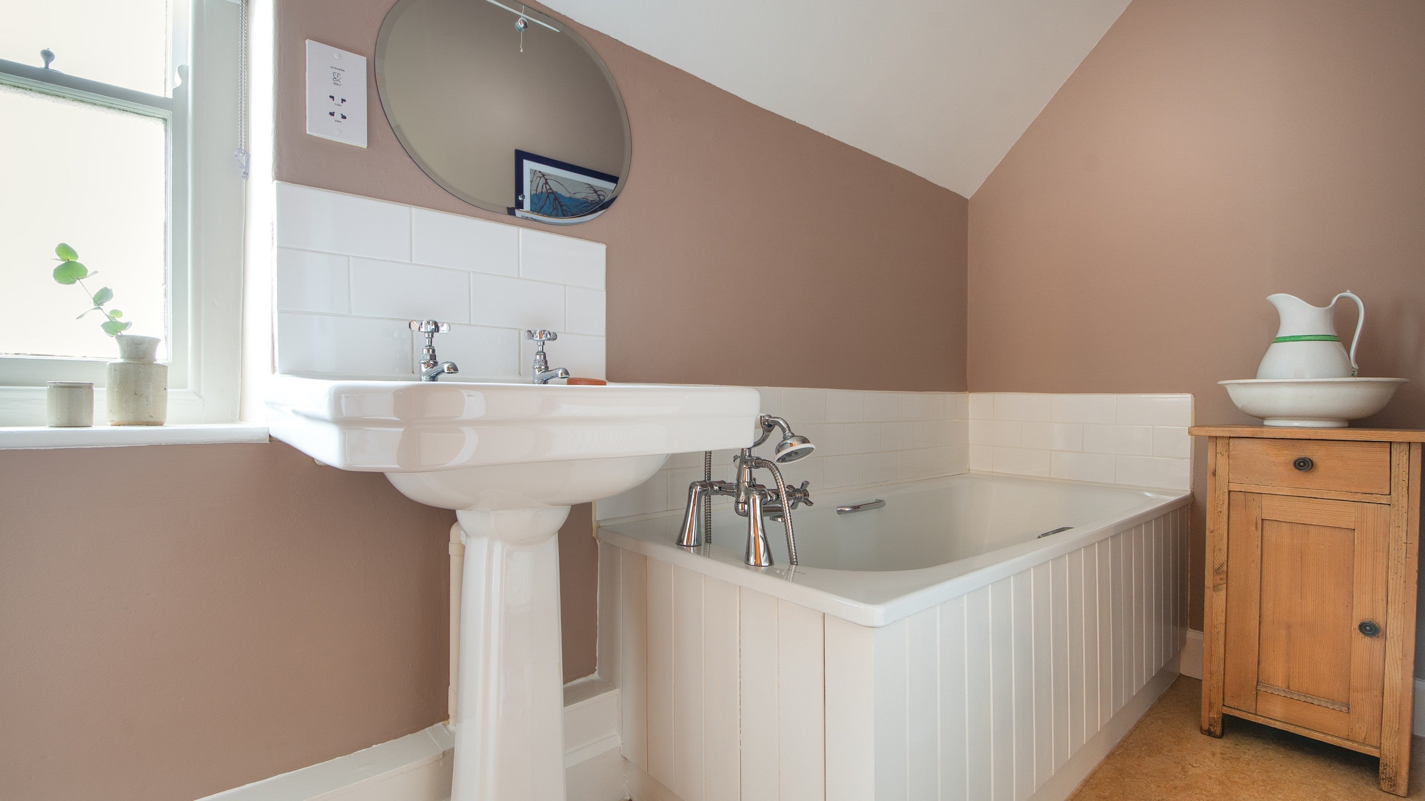 The first -floor bathroom at Penparc, with bath with shower attachment, Carmarthenshire