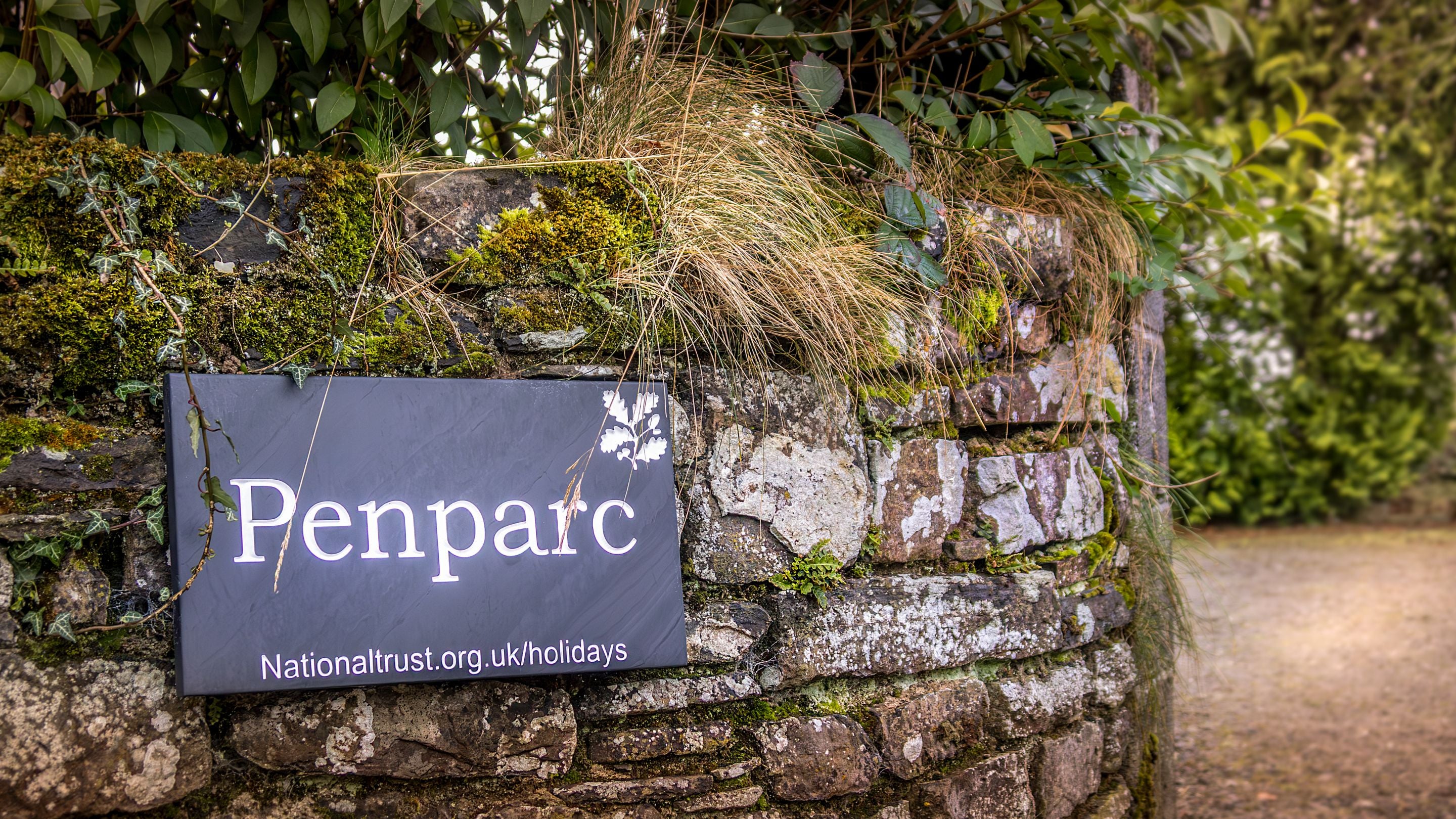 The sign for Penparc on the wall by the lane to the cottage, Carmarthenshire