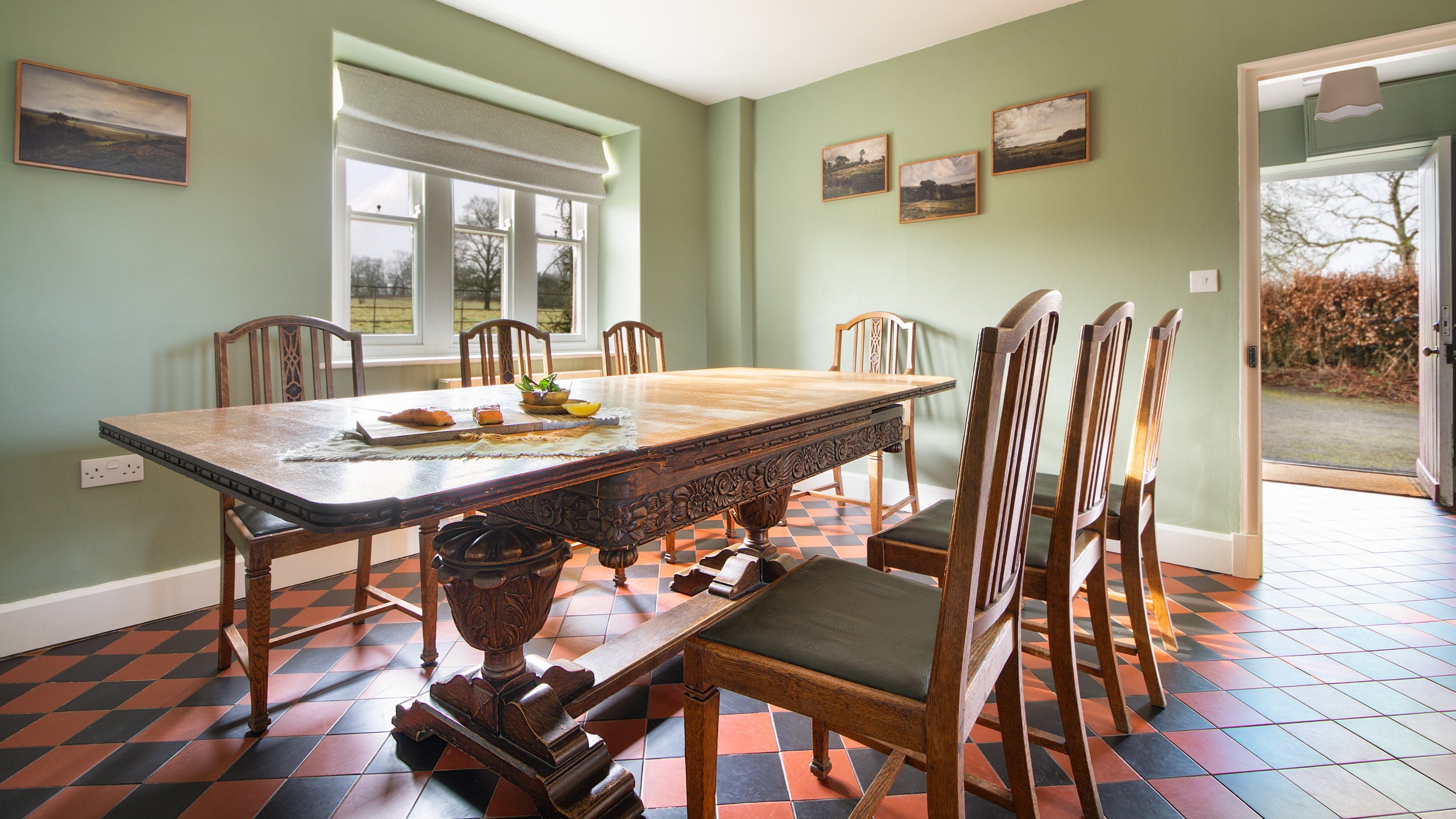 The table in the open-plan kitchen and dining room at Penparc, Carmarthenshire