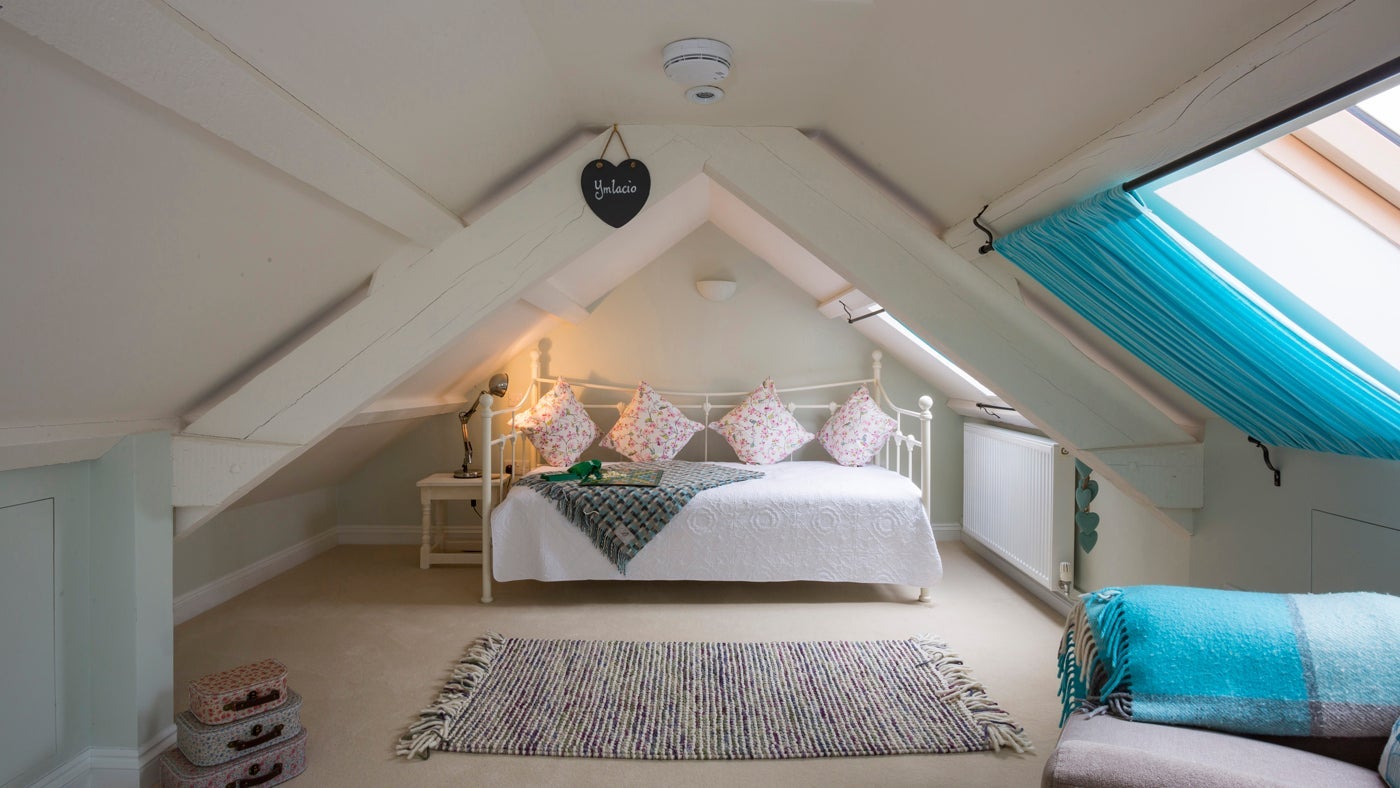 The upstairs reading room with day bed at Penrhyn Mawr, Anglesey