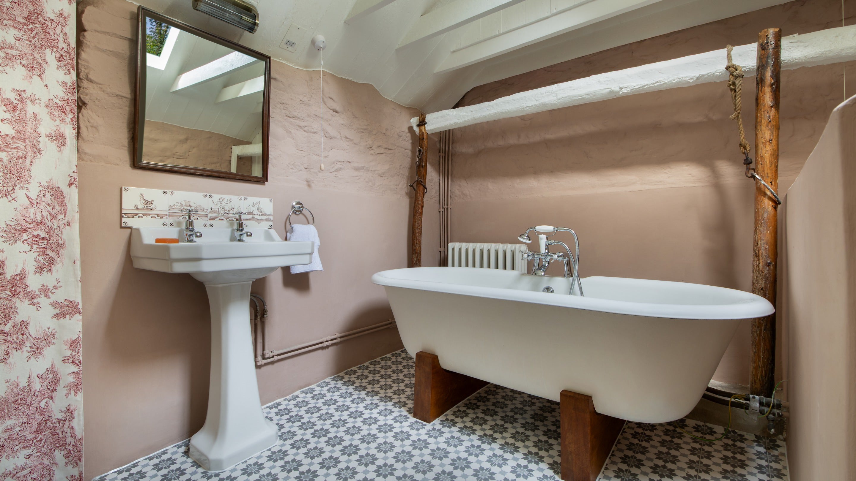 The bathroom with roll-top bath with shower attachment (no wall hook) at Pontbrenmydyr, Ceredigion