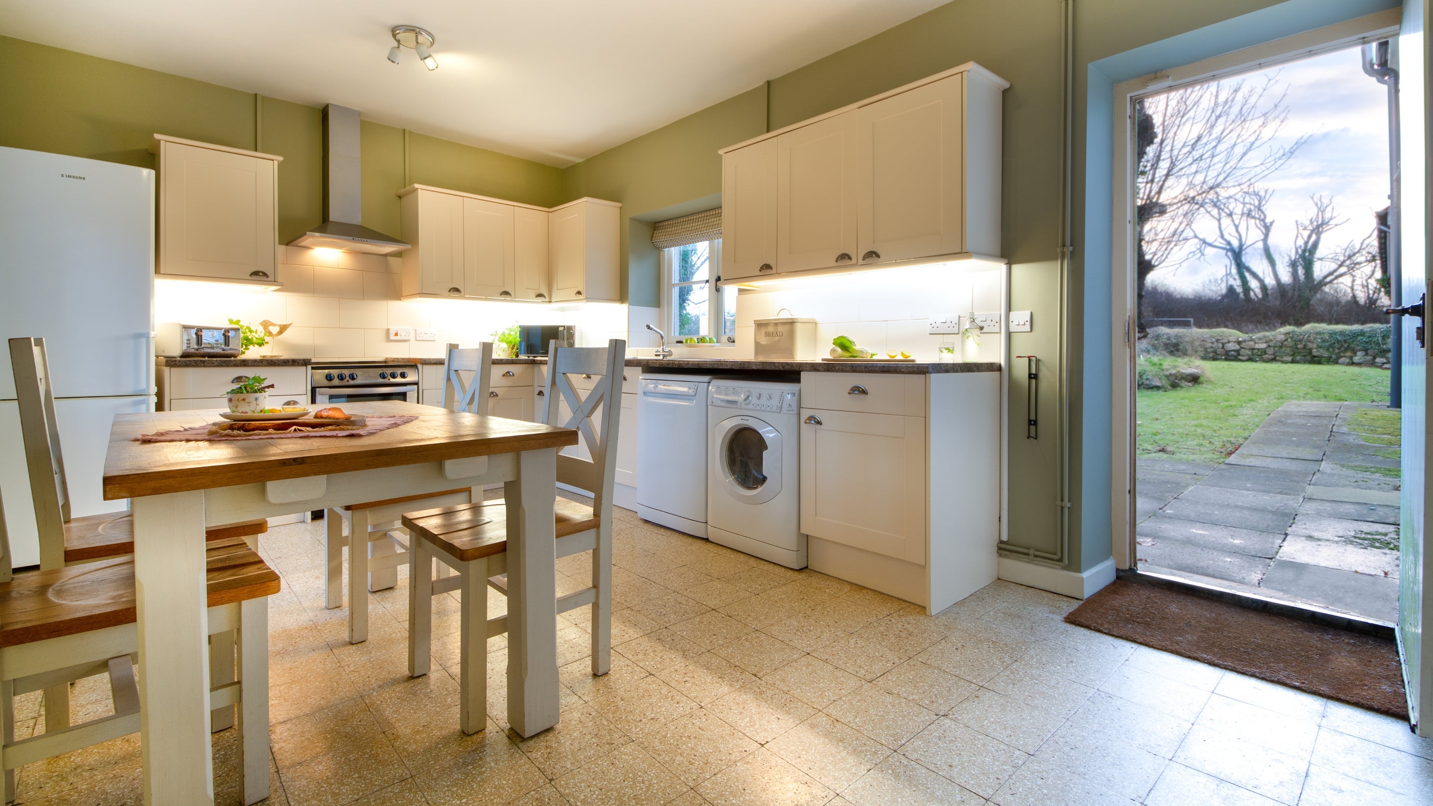The kitchen and dining room at South Pilton Green Farmhouse, West Glamorgan