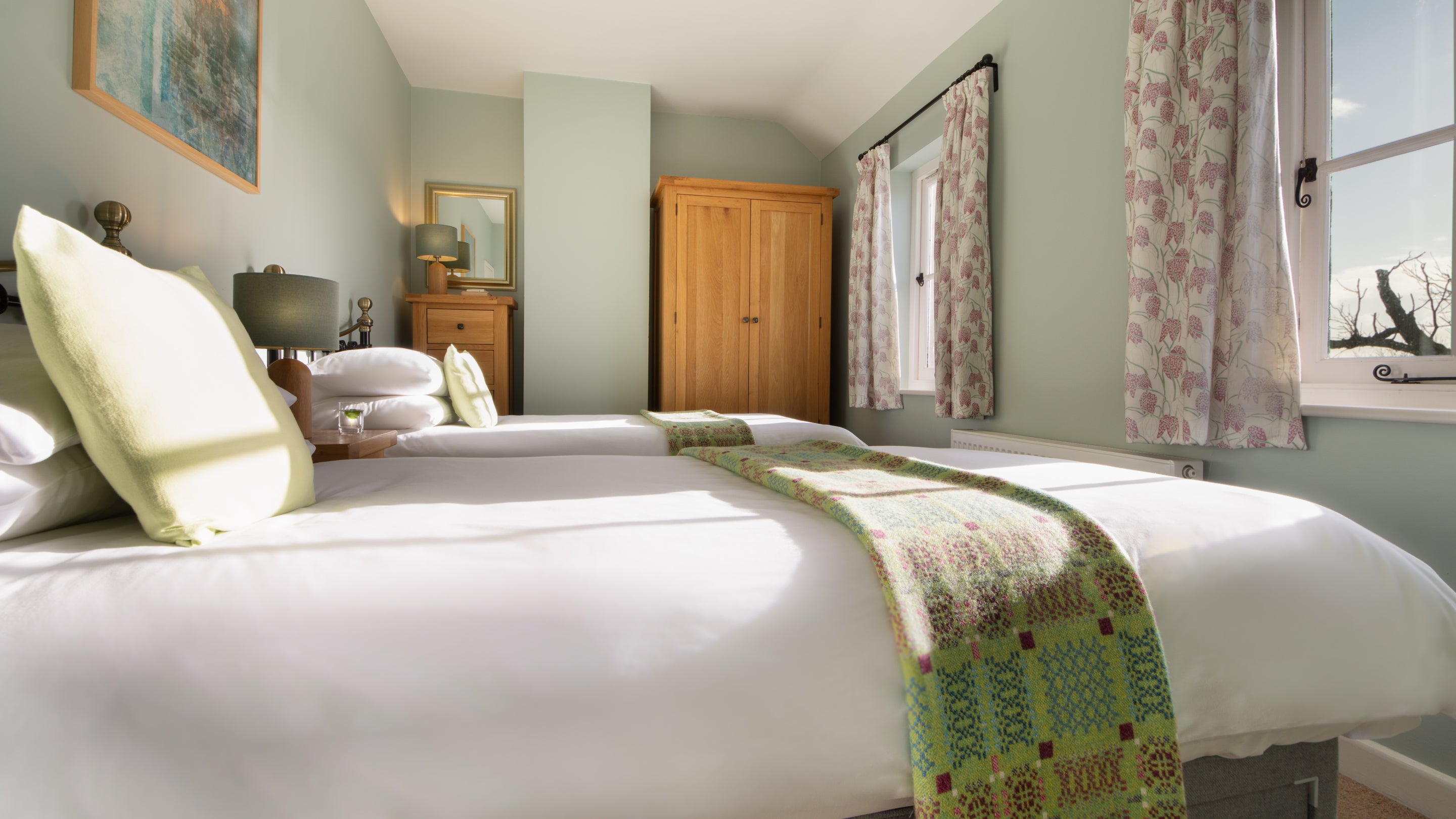 The twin bedroom at South Pilton Green Farmhouse, West Glamorgan