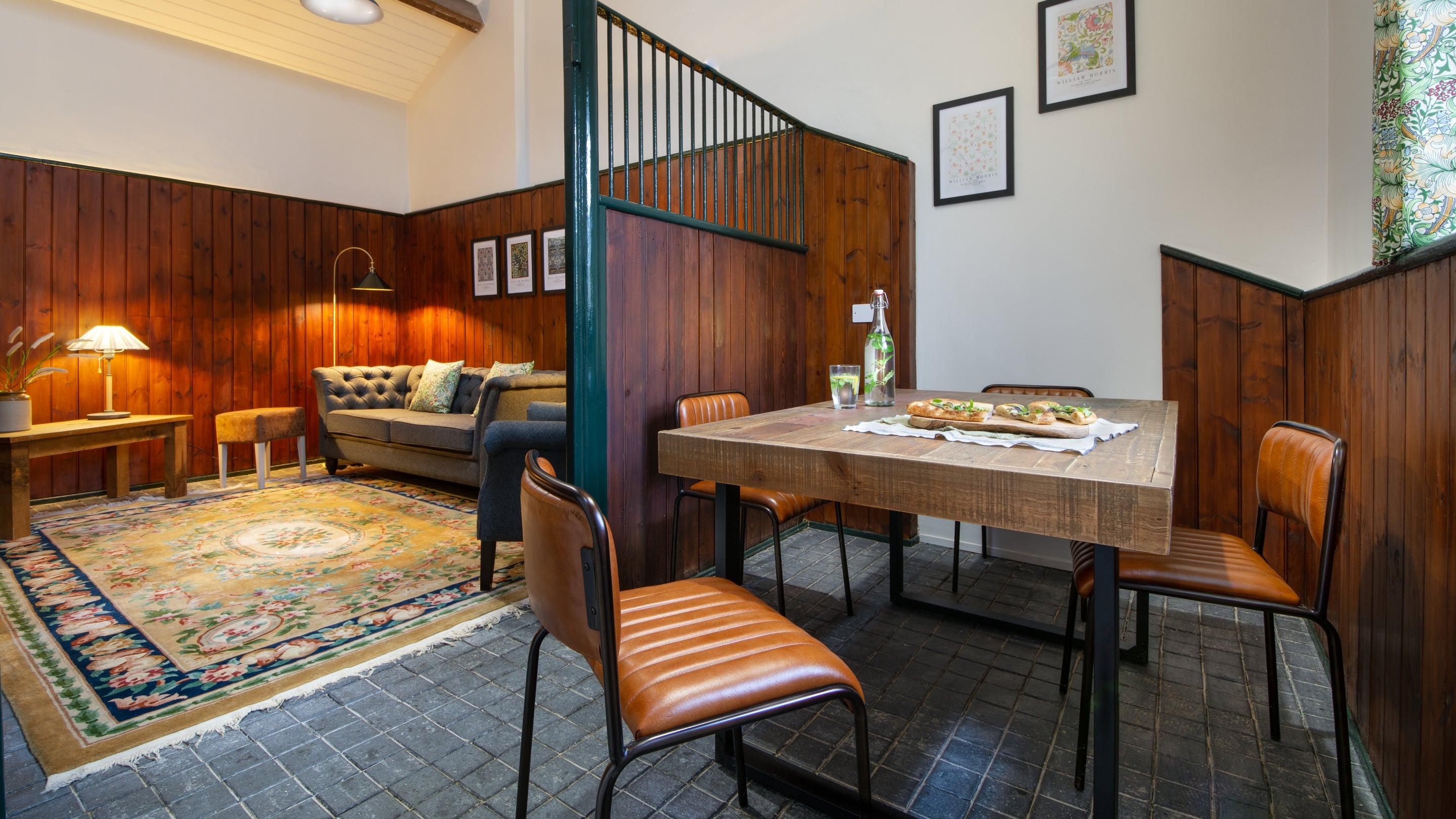 The sitting and dining room at Stabl Bach, Gwynedd