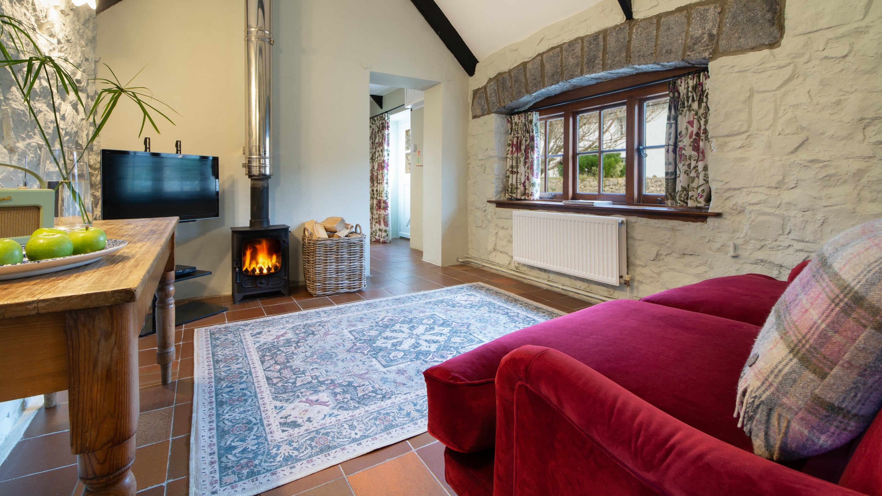 The sitting and dining room at Stackpole Byre 1, Pembrokeshire