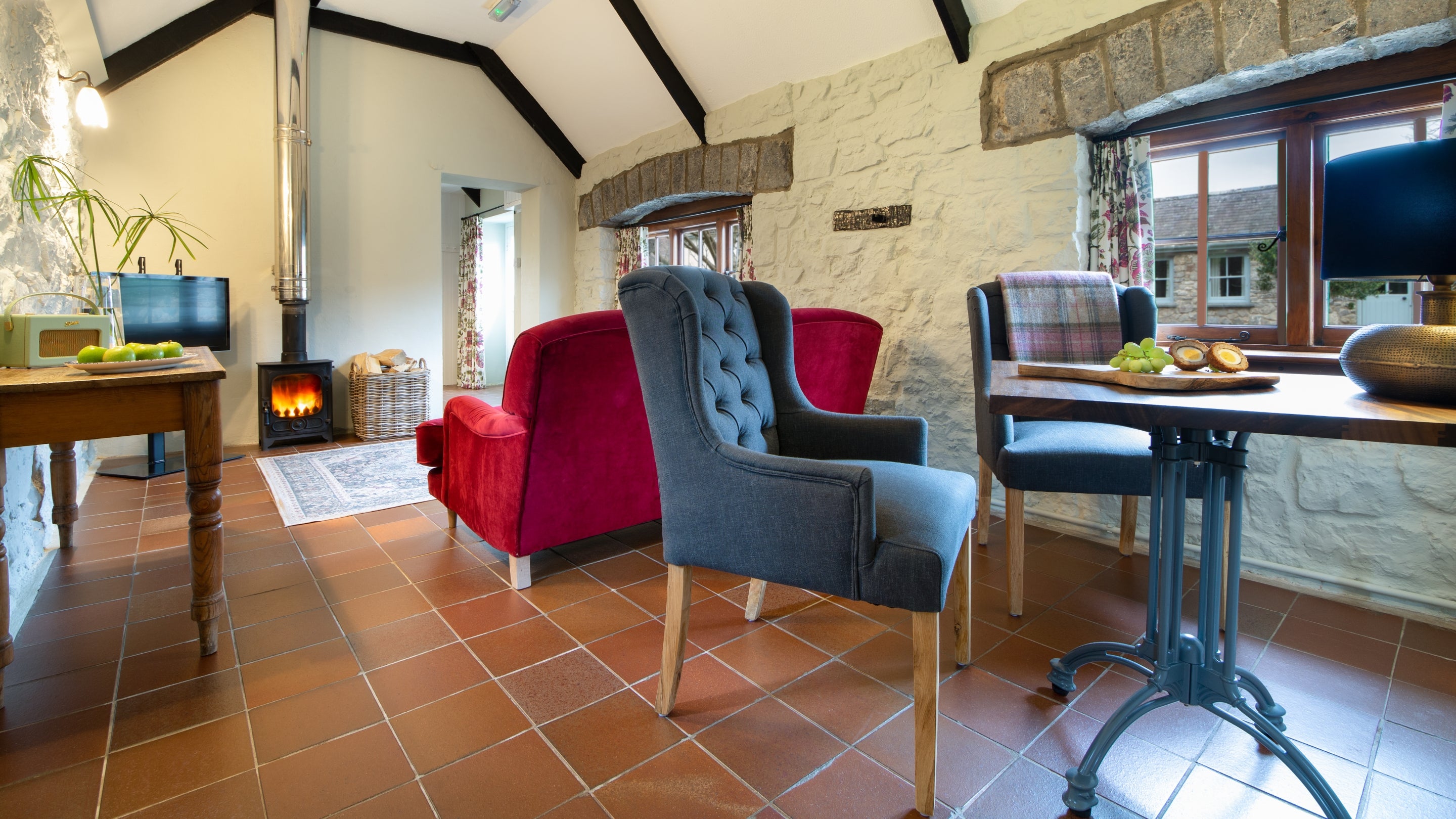 The sitting and dining room at Stackpole Byre 1, Pembrokeshire