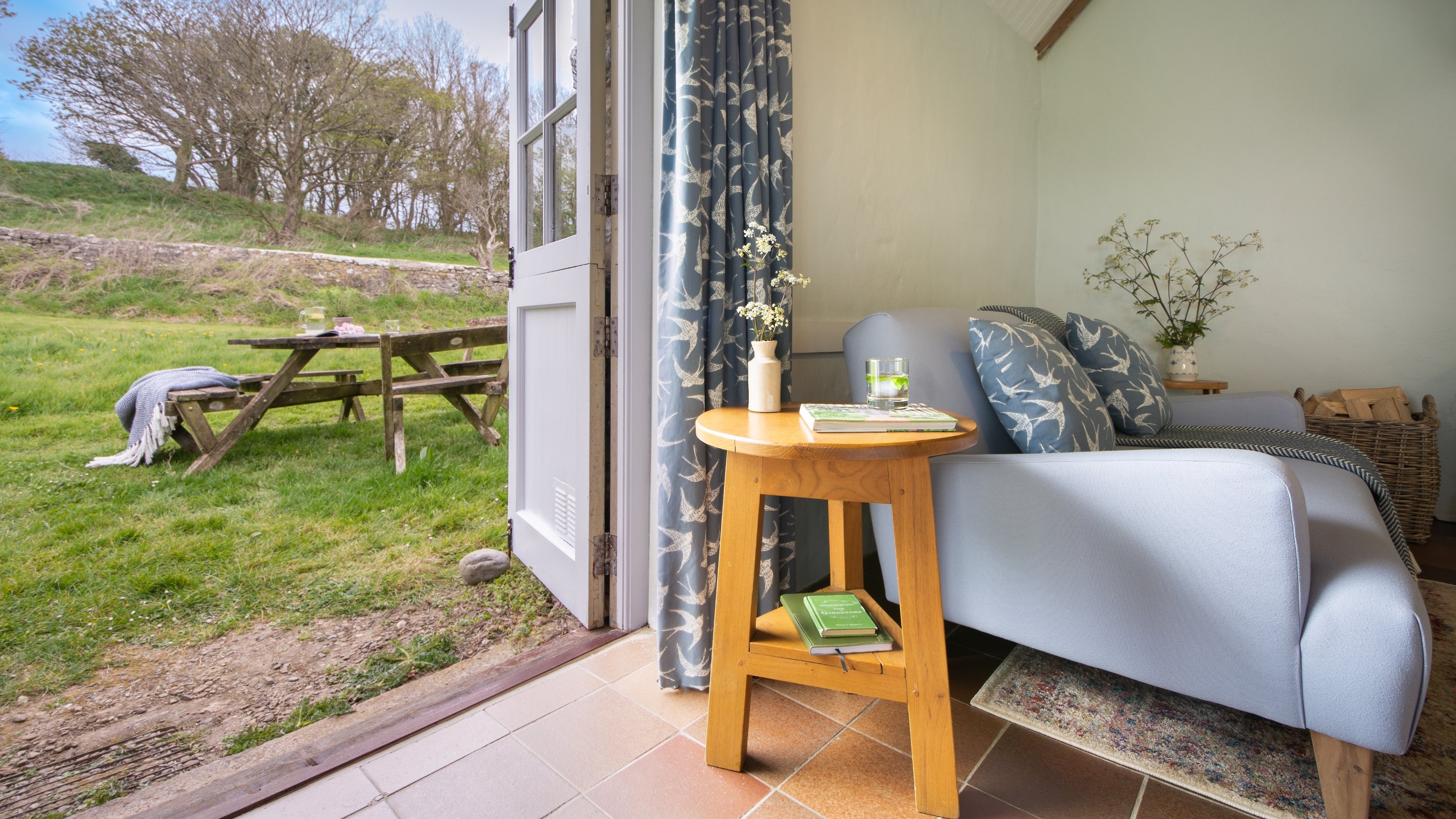 The view to the outdoor seating area at Stackpole Byre 2, Pembrokeshire