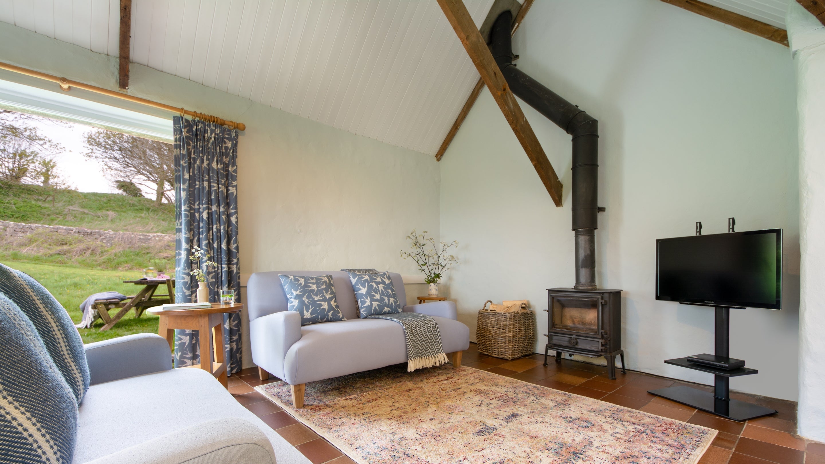 The open plan sitting room at Stackpole Byre 2, Pembrokeshire
