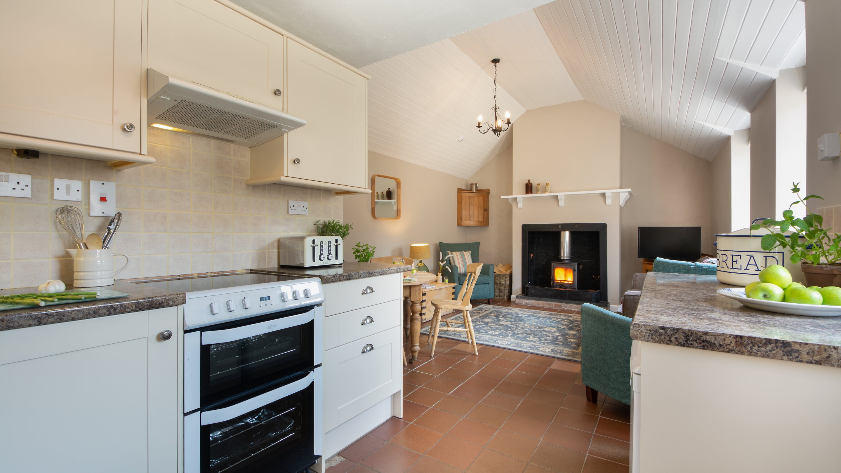 The kitchen, dining and sitting room at Stackpole Dairy Cottage, Pembrokeshire