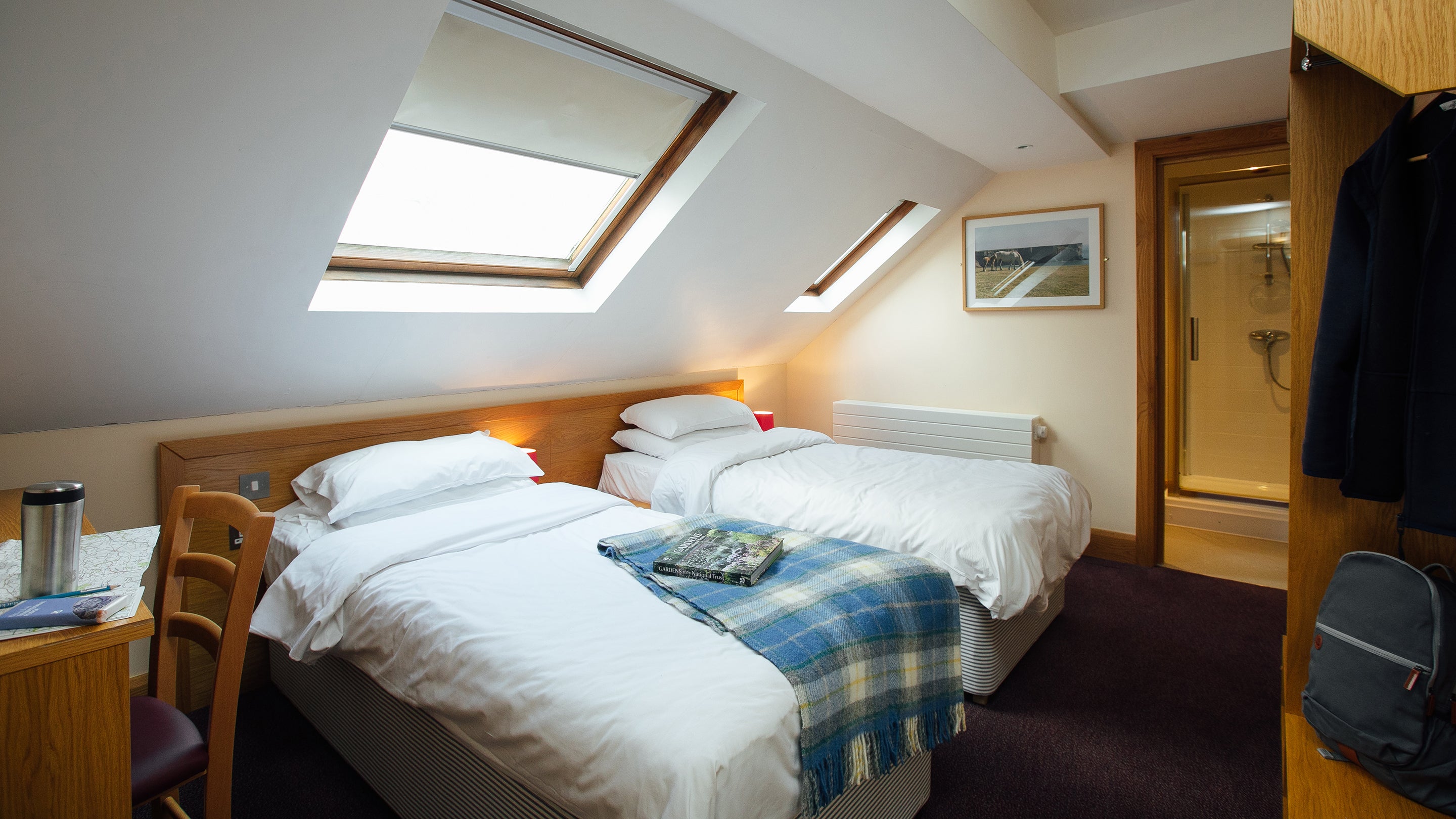 A first floor bedroom at Swan Group House, Pembrokeshire