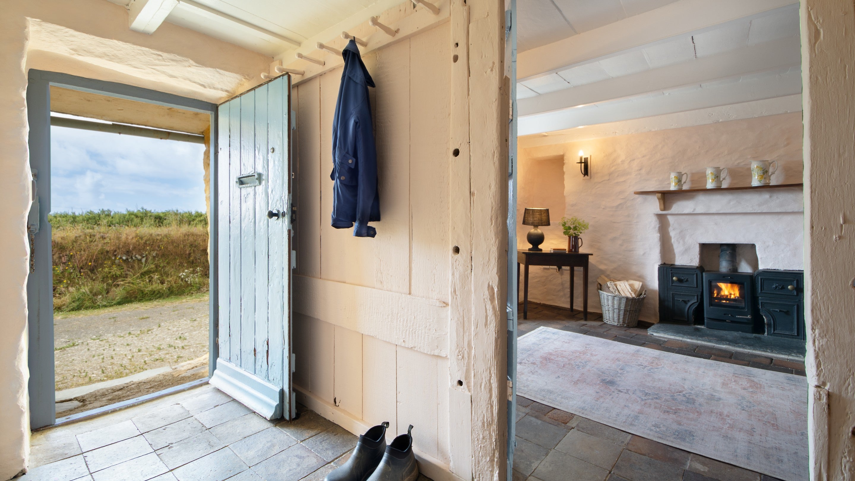 Looking from the entrance parlour into the sitting room at Treleddyd Fawr Cottage, Pembrokeshire