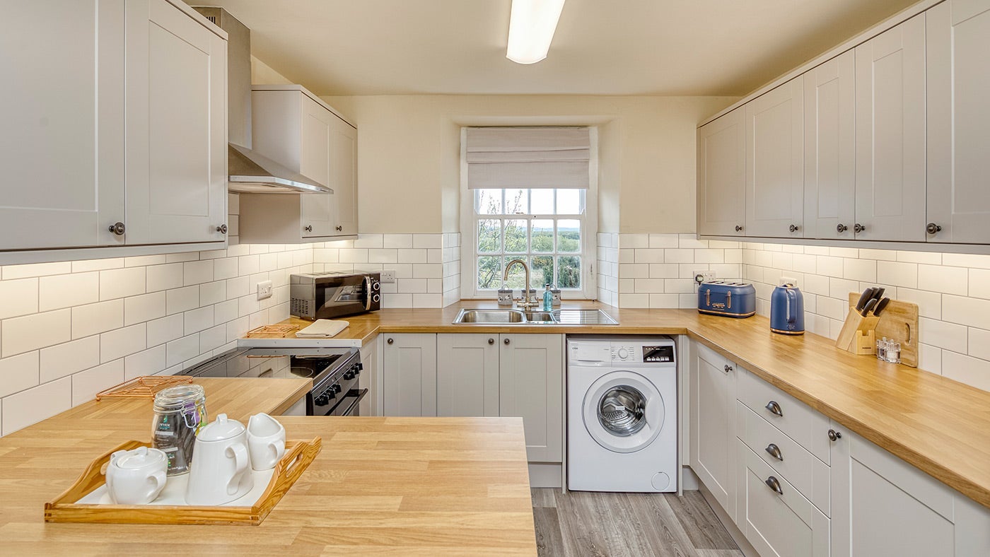 The kitchen at Ty'n y Parc Farmhouse and Barn, Gwynedd, Wales