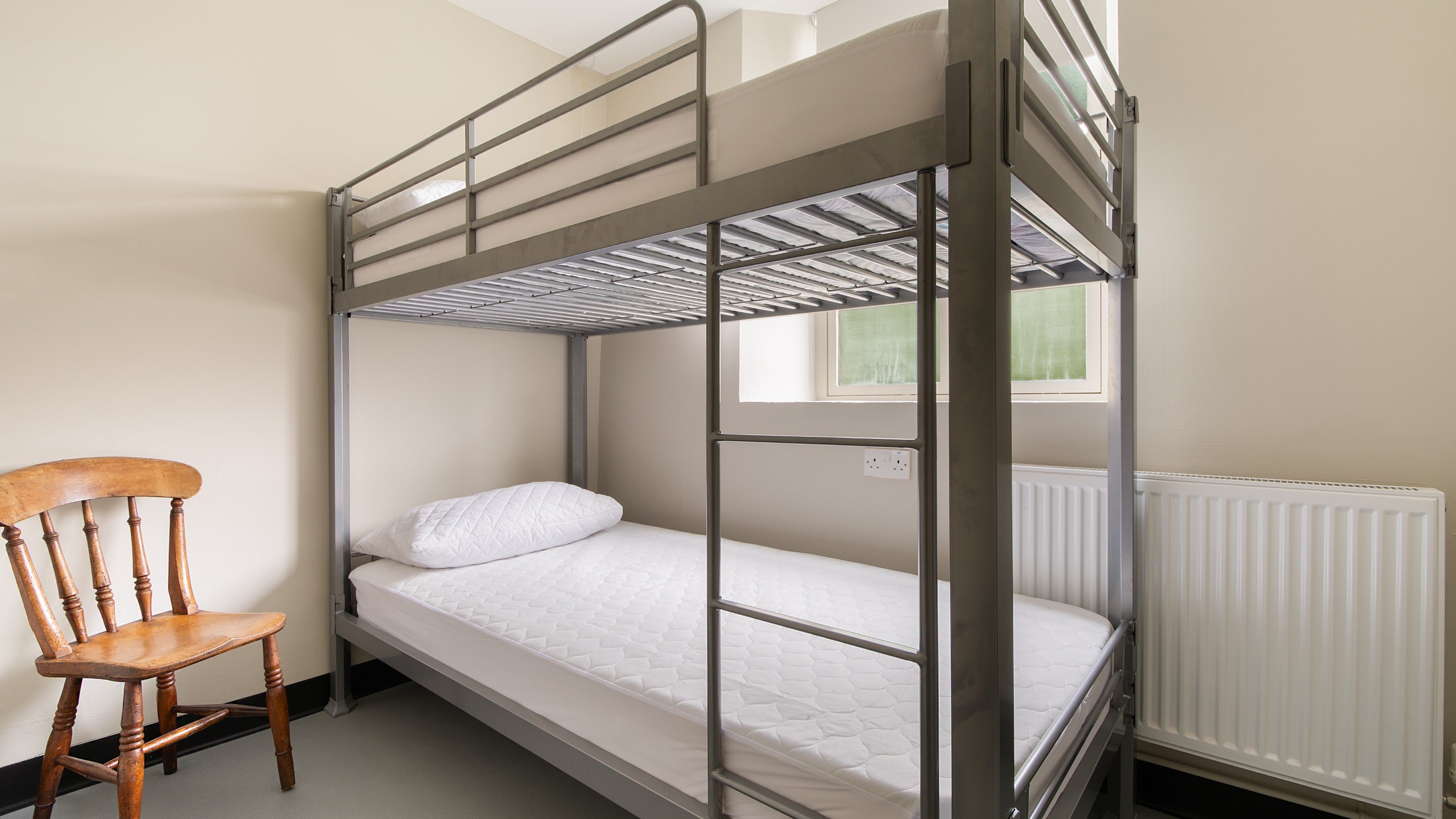 The bunkroom with one bunkbed, sleeping two, on the ground floor of Watkin Bunkhouse, Gwynedd