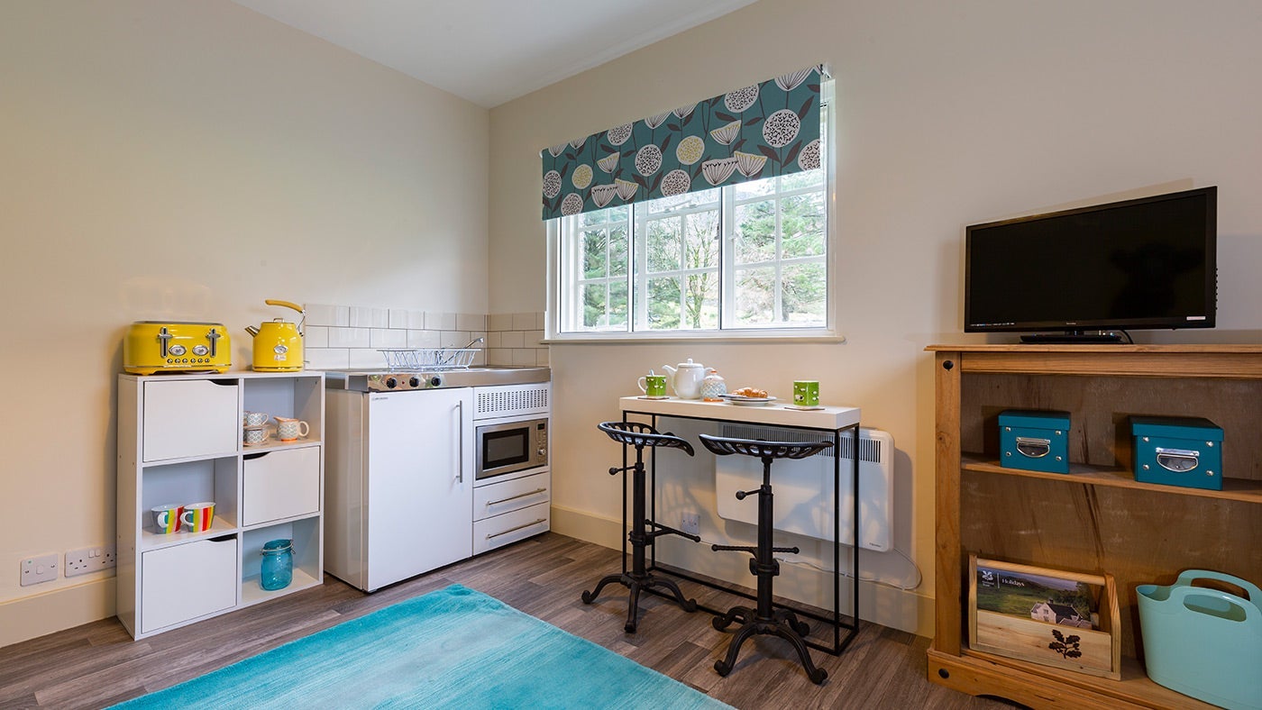 The kitchen and sitting room at Y Wenallt, Gwynedd 