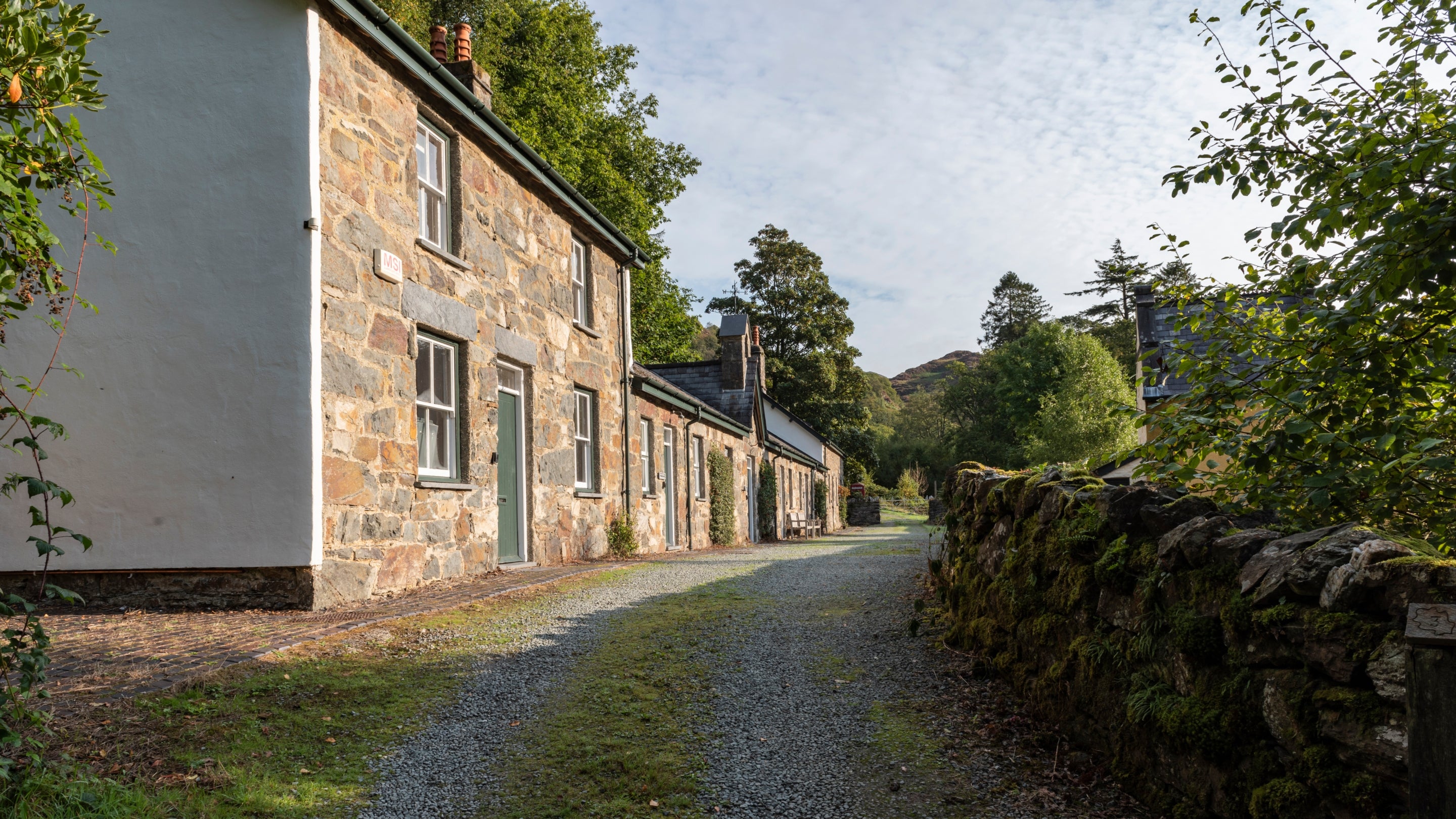 The exterior of Yr Hen Swyddfa and the Craflwyn cottages, Gwynedd