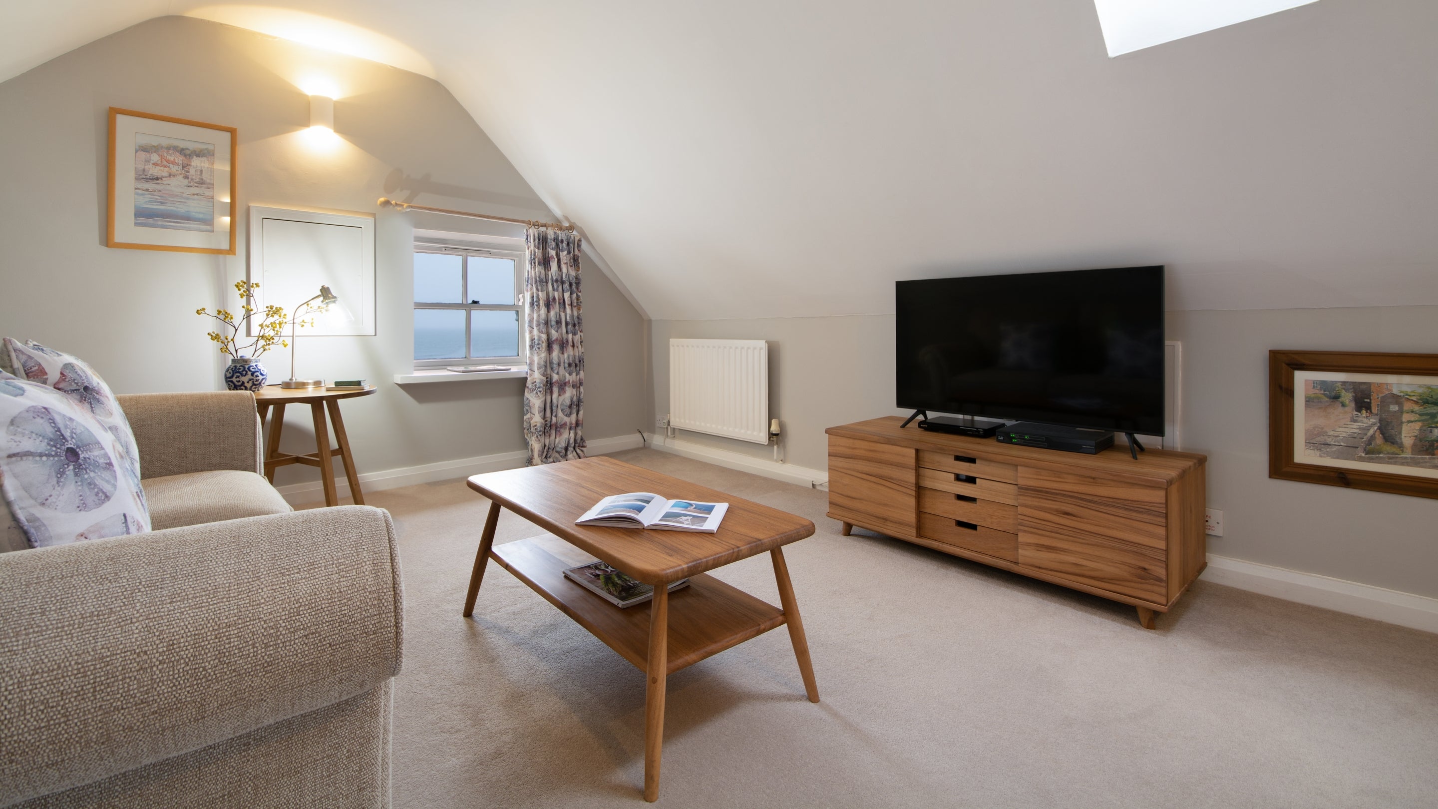 The open-plan kitchen, sitting and dining room at Boatman's Loft, Yorkshire