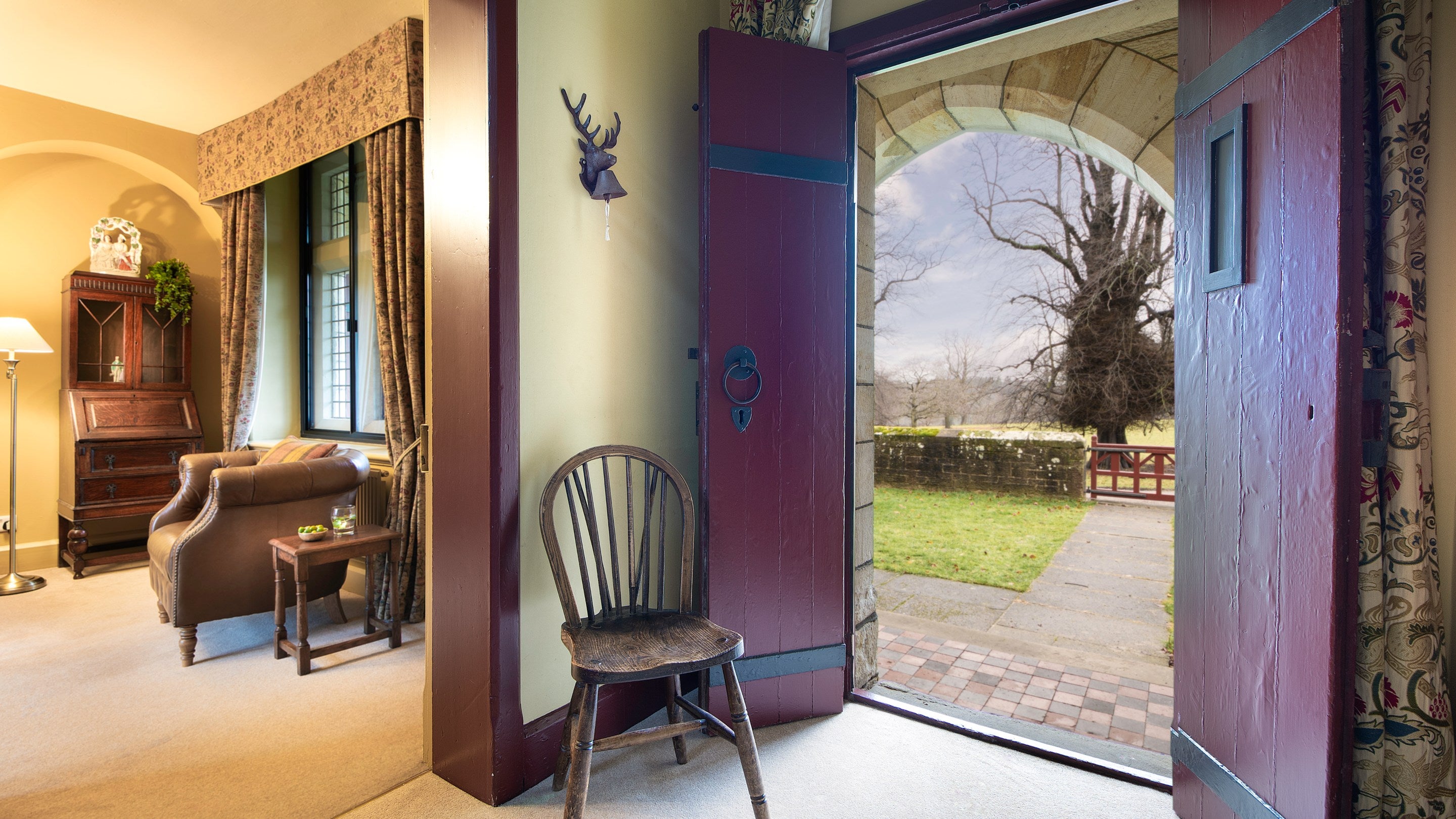 The hallway with door to the enclosed garden at Choristers' House, Yorkshire