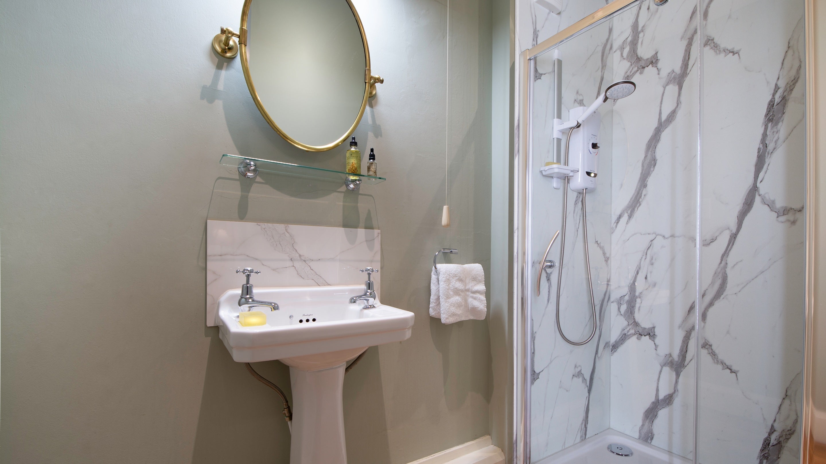 The ground floor bedroom at Choristers' House has a shower and sink in its alcove, Yorkshire