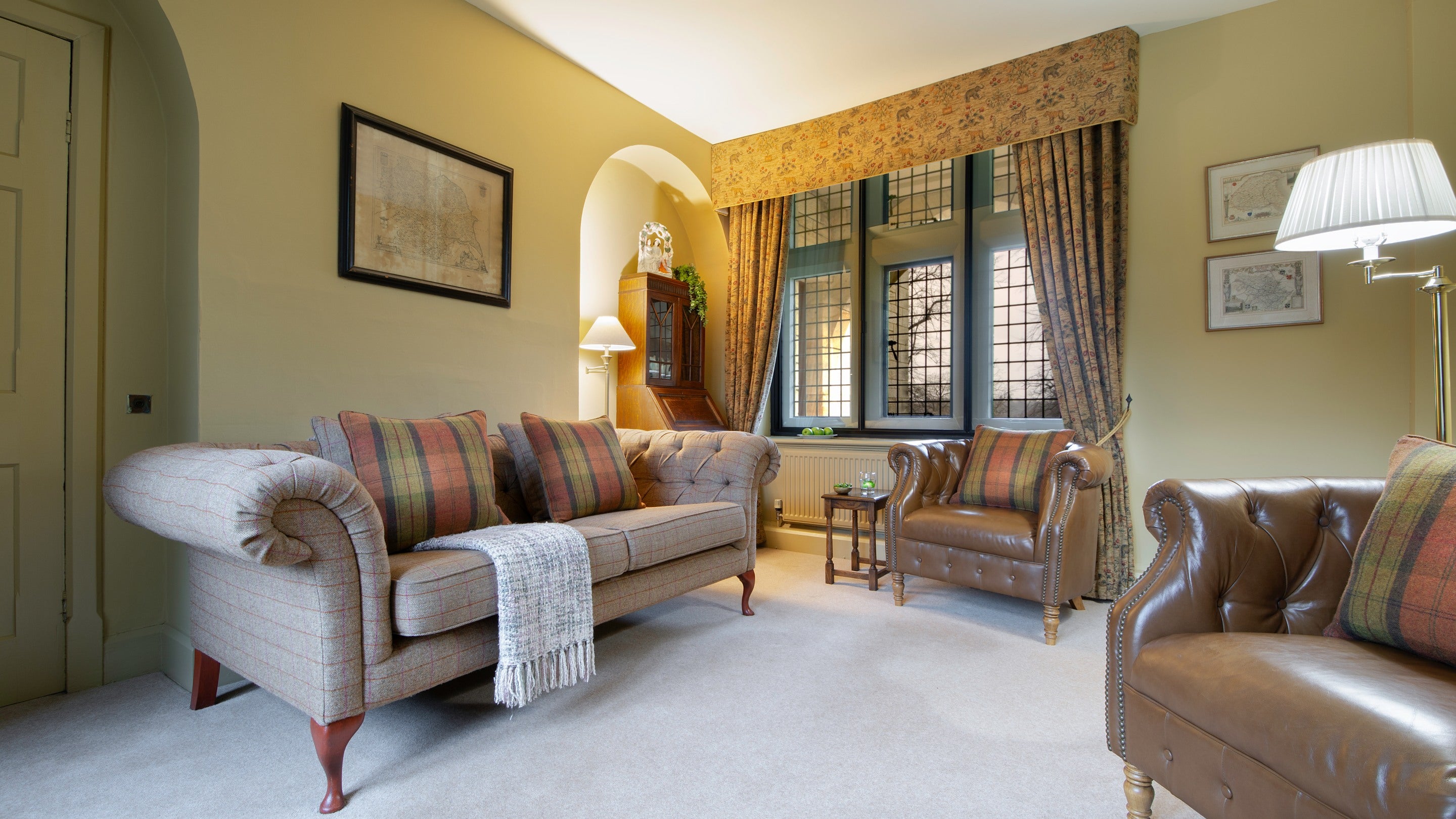 The casual sitting room, also know as the TV room, is a cosy space at Choristers' House, Yorkshire