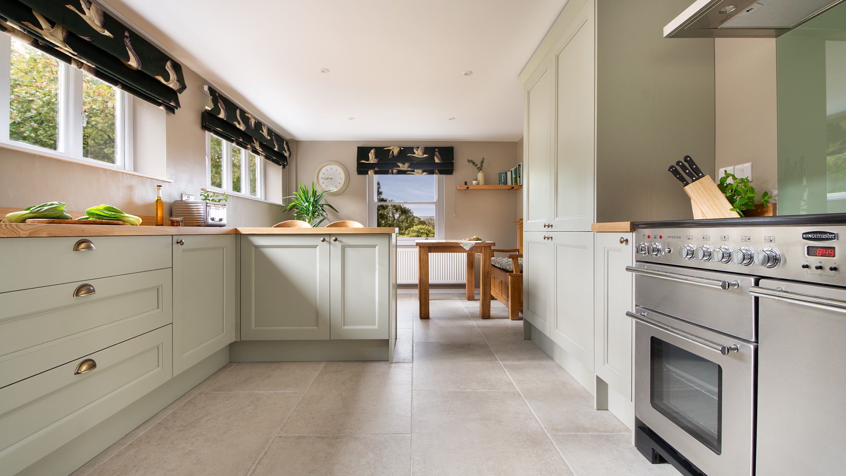 The kitchen with table at Druid's Cave Farmhouse, North Yorkshire