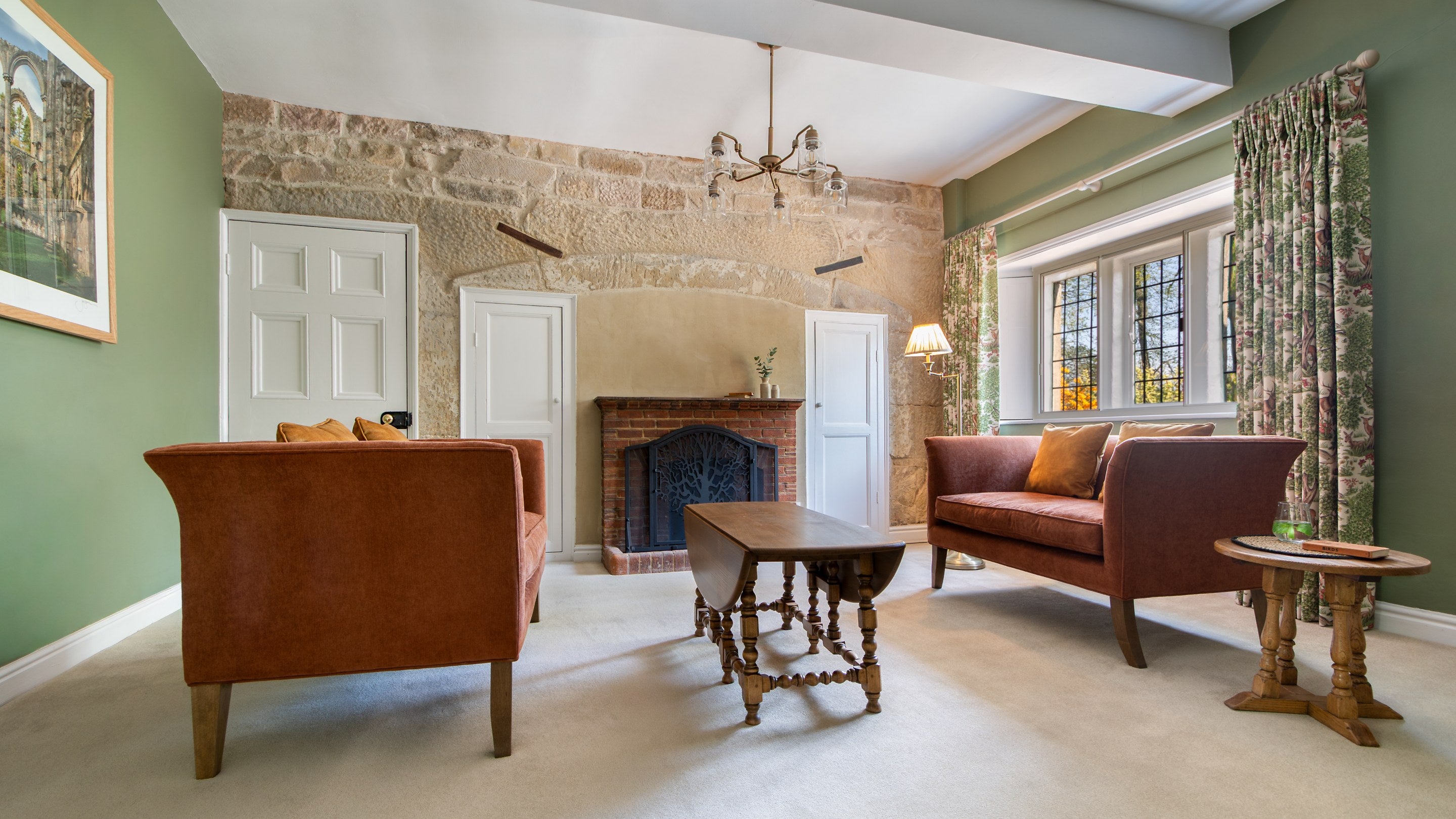 The snug with ornamental fireplace at Fountains Cottage, Yorkshire